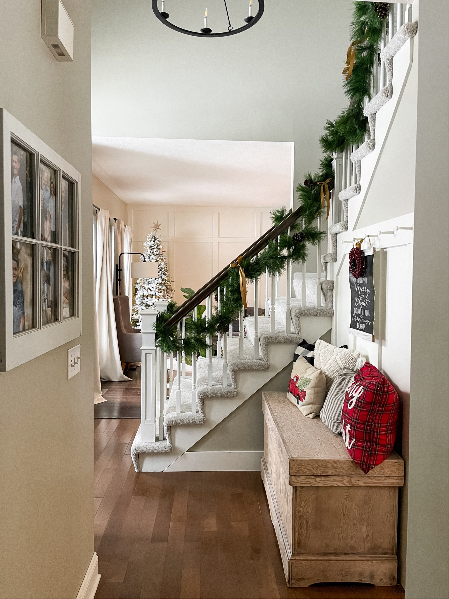 Our entryway decorated for Christmas with red pillows and garland.  

Christmas entryway.  Christmas staircase.  Christmas decorations.  

#LTKHoliday #LTKSeasonal #LTKhome