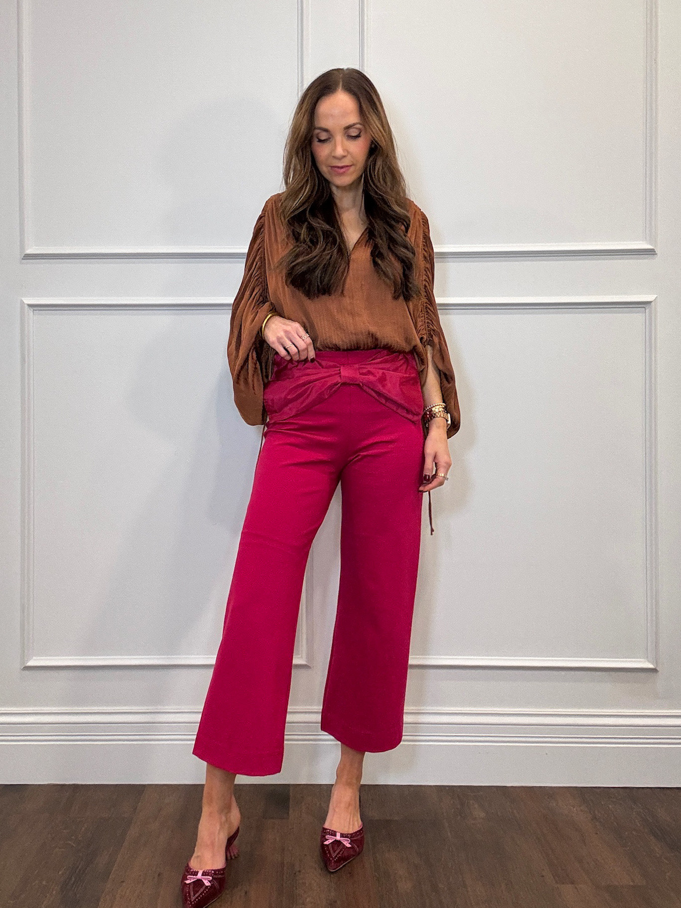 Dressing up these pants for the holidays! Love the cooper color with the pink. Size up in the pants. @anthropologie 

#LTKHoliday