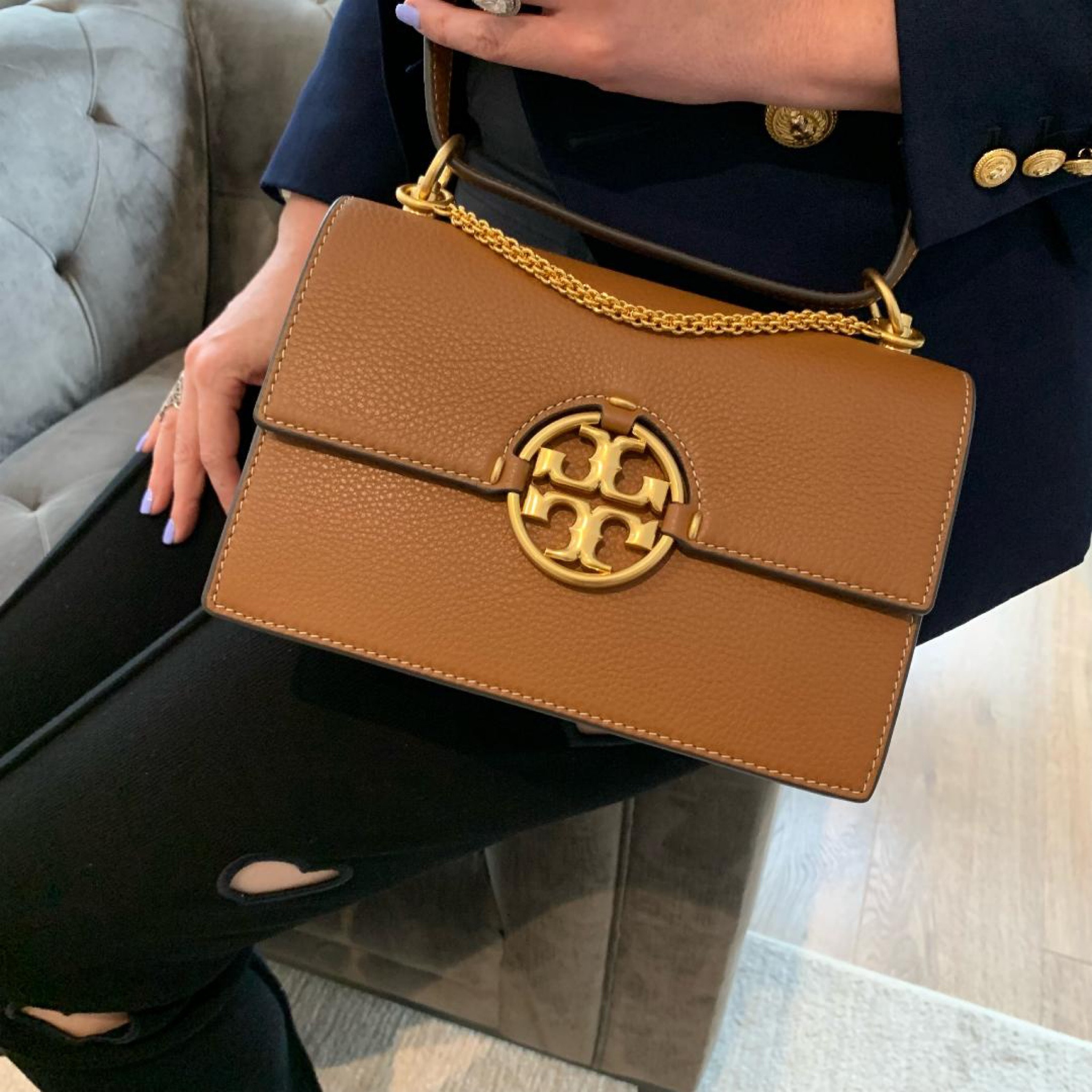 Brown handbag, tony burch cross body chain bag, black heart cut out trousers, navy blazer 

#LTKstyletip #LTKSeasonal #LTKitbag