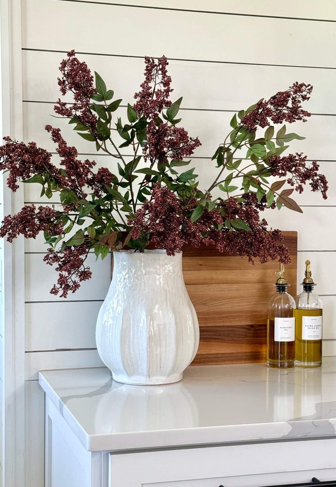 Happy September! It’s so hot I can’t go up in the attic to get my fall bins out lol. I’m trying to resist buying new decor this year, but I did just get the stems and I’m obsessed! I’ve been wanting some like these for a long time, but they are usually so expensive. These came out to only $10 a stem! I used three in this vase, which is also one of my favorite finds! ￼

#LTKSeasonal #LTKHome #LTKSaleAlert