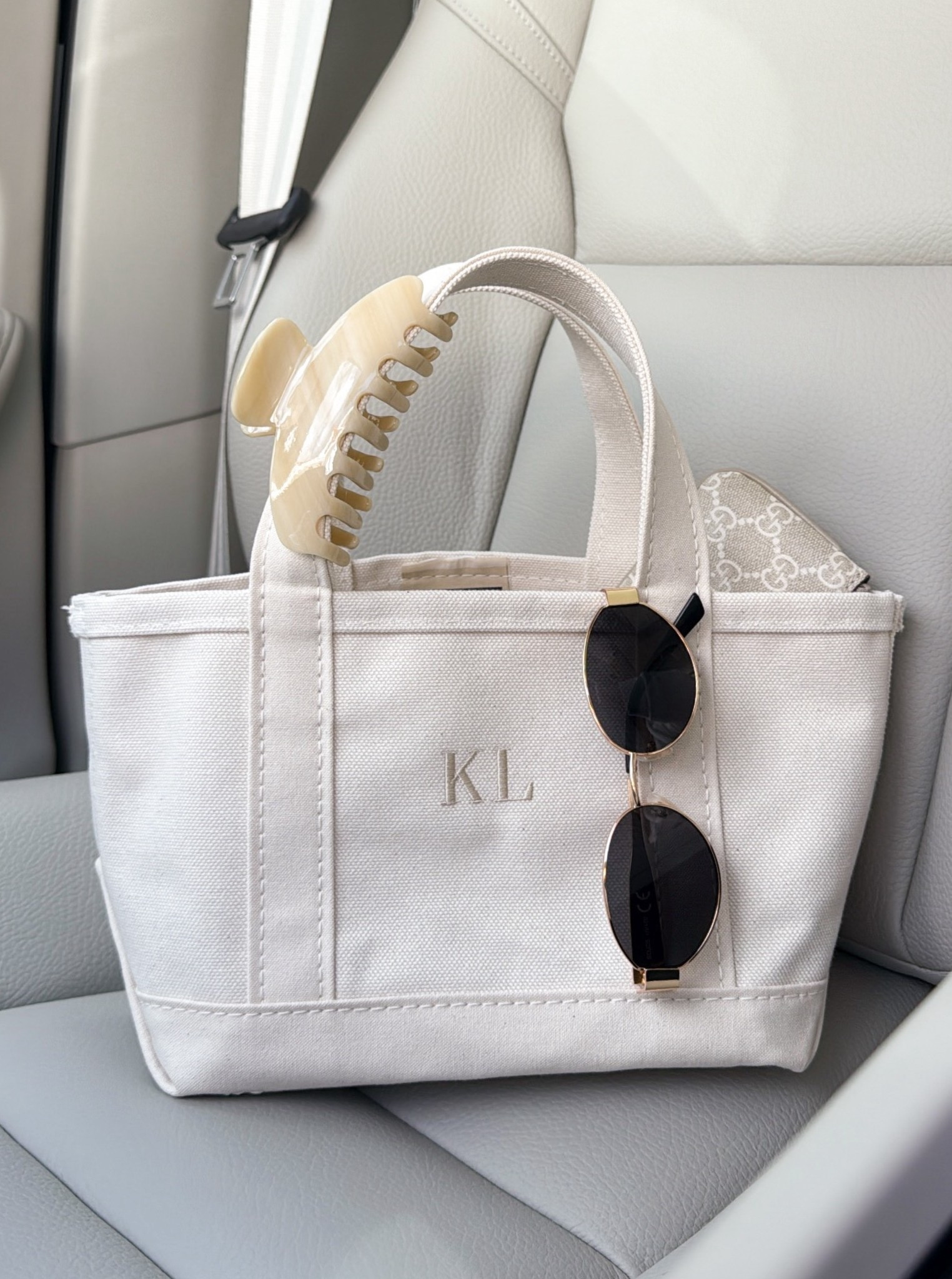 The cutest mini tote for spring and summer! It’s mini but fits soo much. I just got an insert for it to better organize it too! 

Thread color: Natural 
Style: Times Bold Uppercase

boat tote, mini bag, embroidered, personalized, bridesmaid gift, neutral accessories, emi jay, gift ideas, gucci key chain pouch, amazon sunglasses, fancythingsblog 

#LTKSeasonal #LTKgrwm #LTKootd