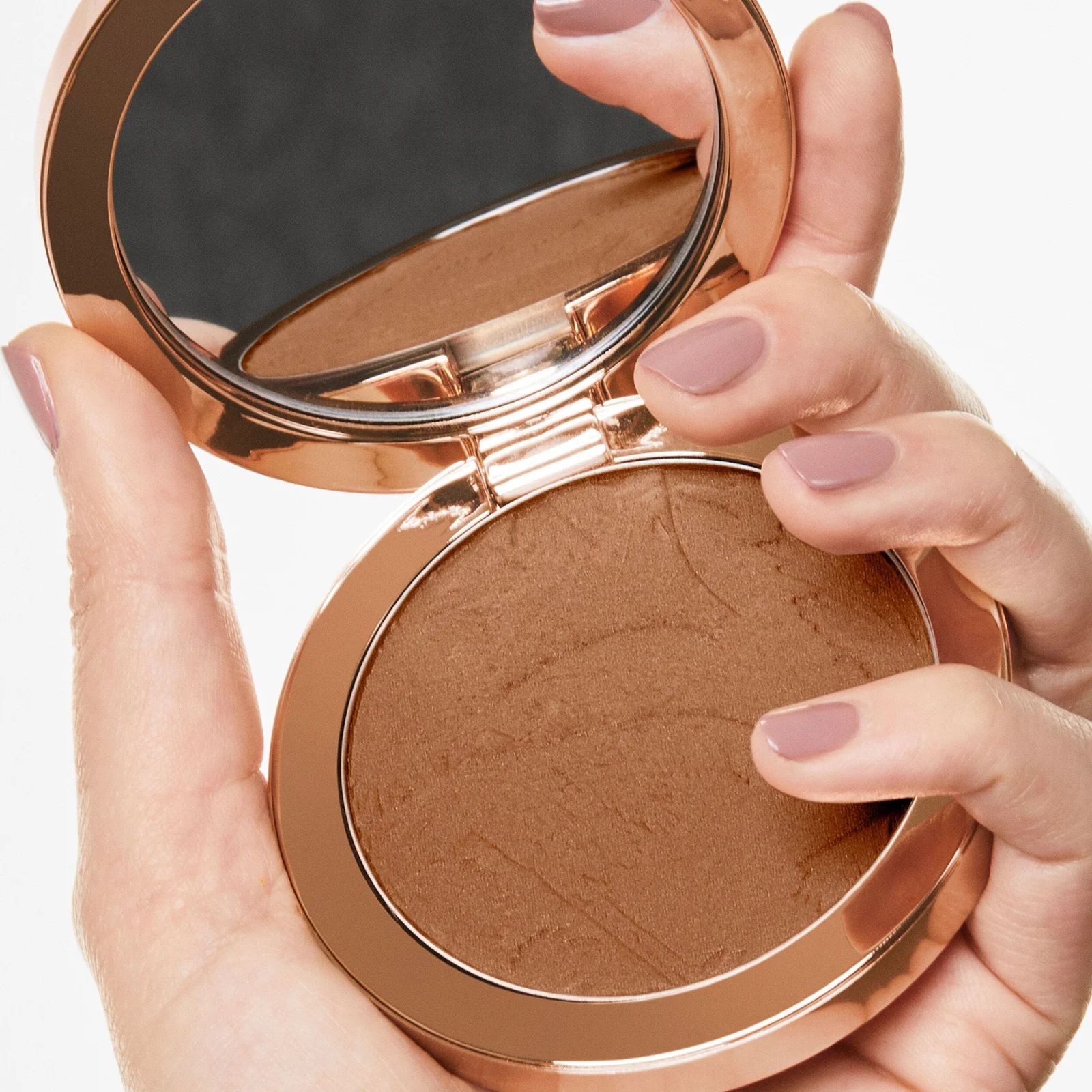 Pure bronzing perfection. (In a responsible, refillable compact.) | Beauty Pie (UK)