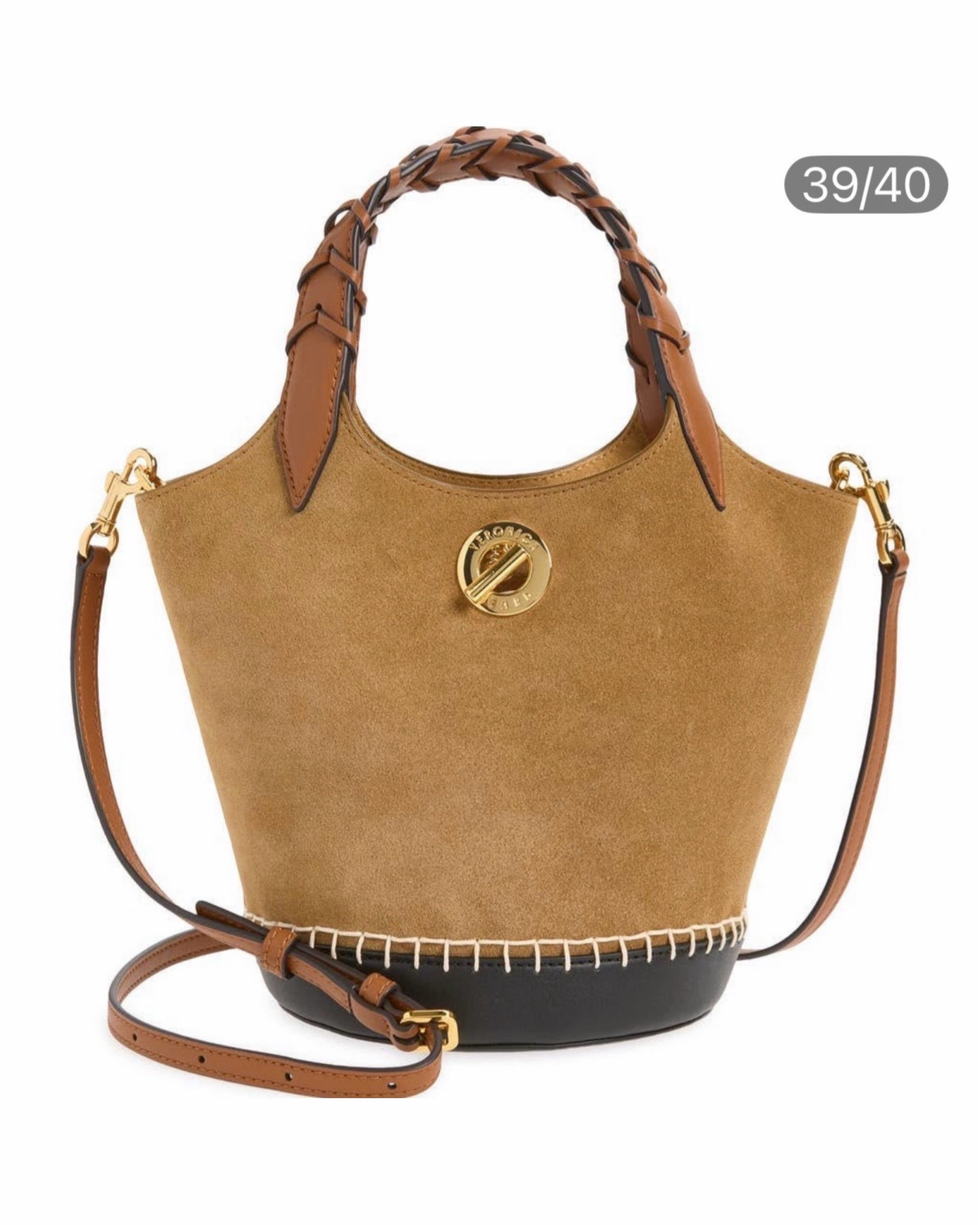 The bucket bag is so chic! Loving the two tone design and stitching details that makes this so eye catching. s