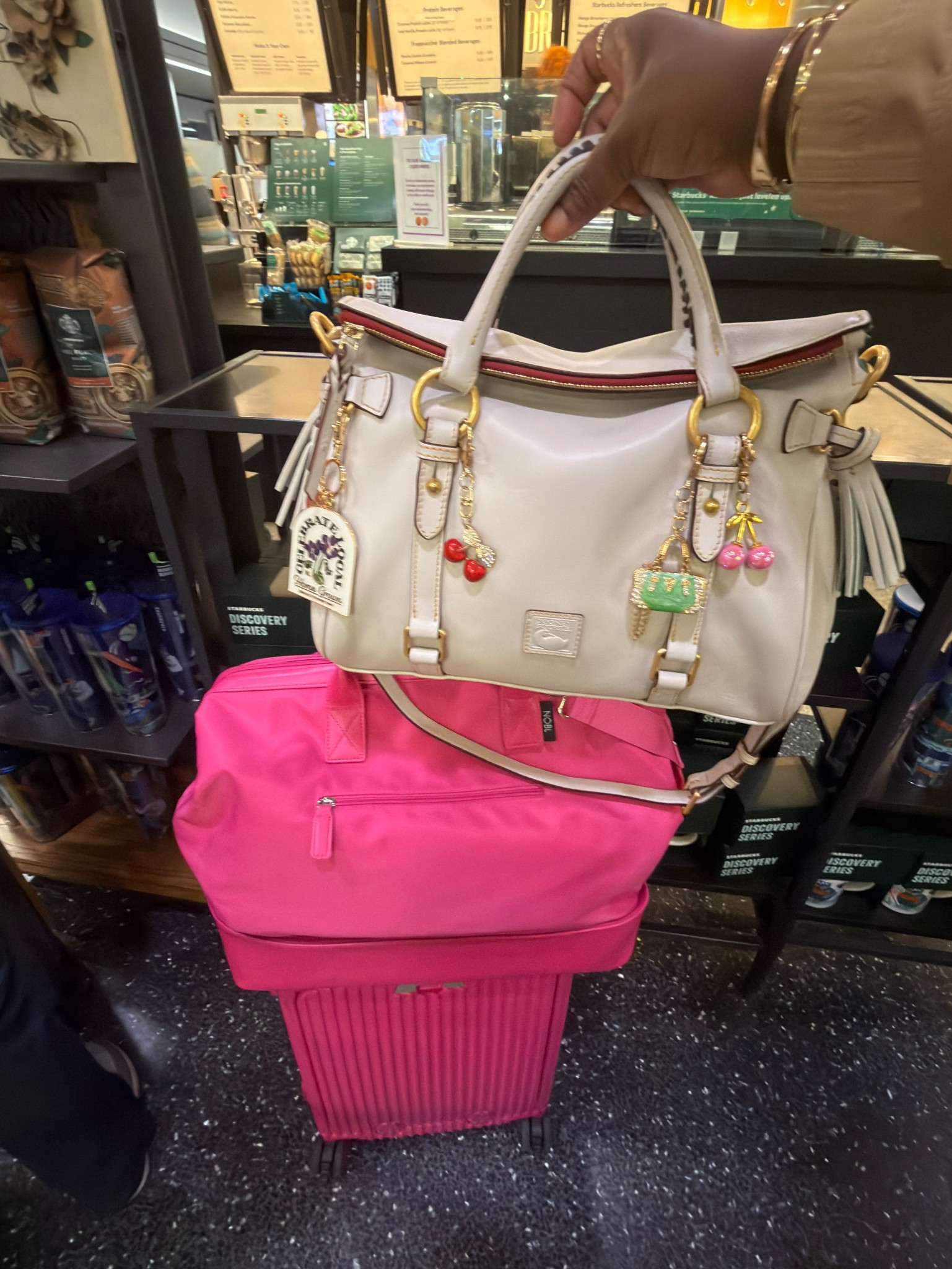 Travel Day Vibes with Dooney & Bourke and NOBL Luggage 