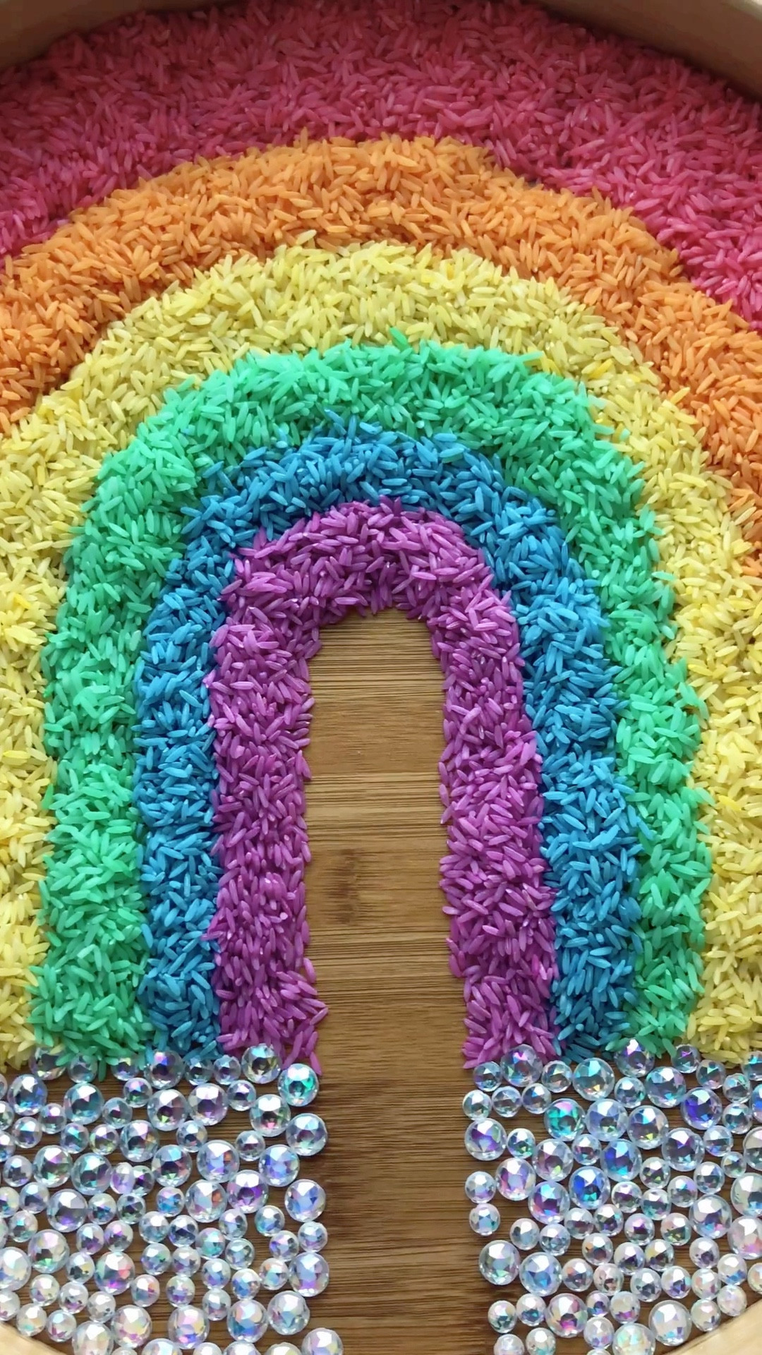 Exploring colors of the rainbow 🌈 
.
Sensory play is more fun when you use rainbow rice! Rainbow rice is easy to make and in just minutes you can create a beautiful and magical sensory experience for your kids!
. 
How to color rice!
1. Add one cup of dried rice to a large ziplock bag. 
2. Add 1 tbsp of vinegar.
3. Add 10-15 drops of food coloring.
4. Mix bag until rice is colorful and then pour out rice onto parchment paper to dry. 
. 
For rainbow rice- do steps 1-4 for each individual color 🌈
.
Enjoy 🌈❤️
.
.
#stpatricksday #stpattysday #rainbowrice #kidscrafts #dollarstorecrafts #diy  #montessori #preschool #playandlearn #playathome #sensoryplay #learningthroughplay #preschoolactivity #montessorikids #playbasedlearning #montessoriathome #aktivitepaylasimi #toddlerlife #homeschool #everydayplayhacks #dollartreeclassrooms #iteachtoo