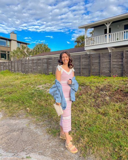 beautiful spring dress
pink stripes, oversized denim jacket, Steve Madden sandals dupe, rattan wristlet purse 

#LTKstyletip