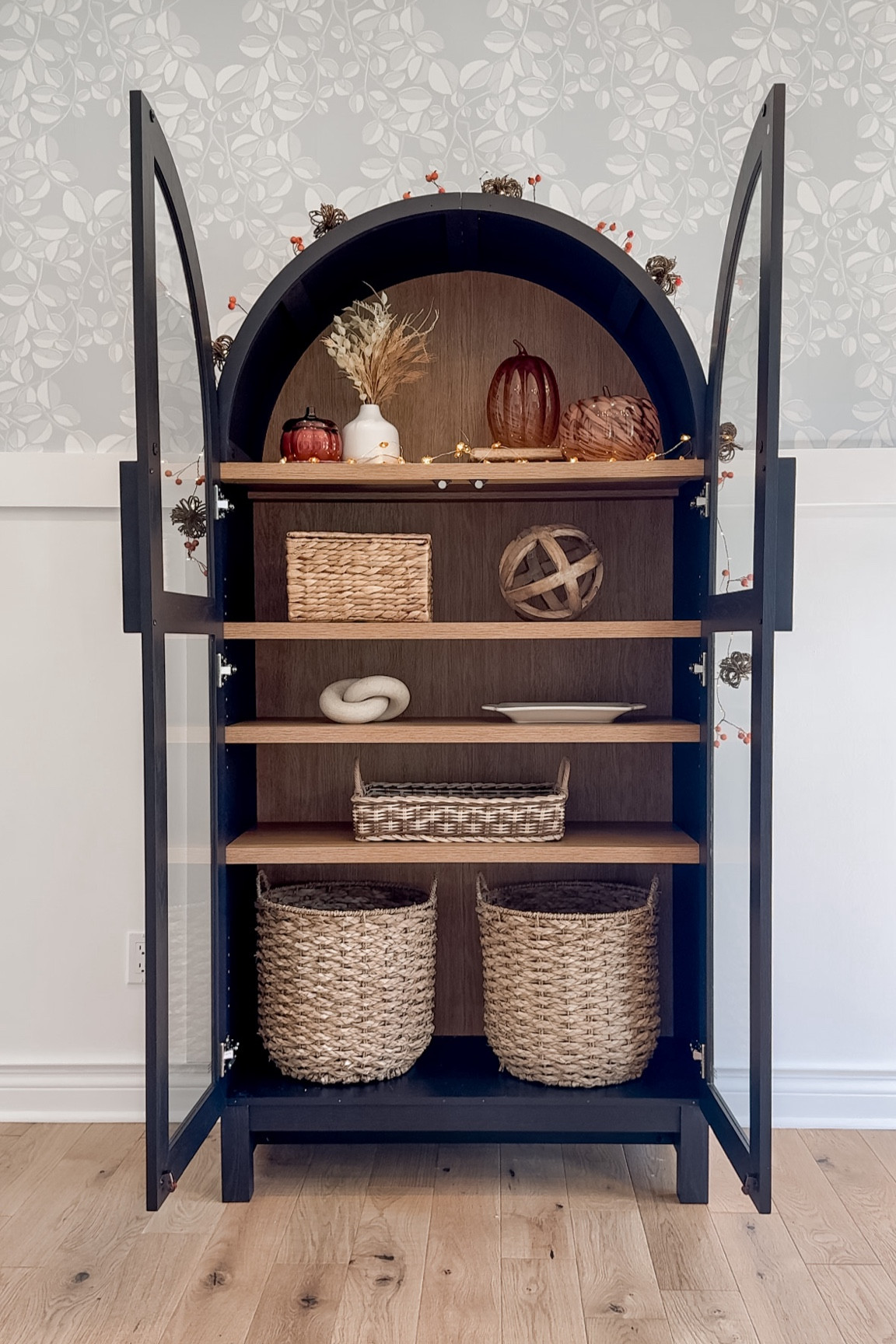 That viral arched cabinet from Walmart + decor linked ✨ 

#LTKHalloween #LTKSeasonal #LTKHome