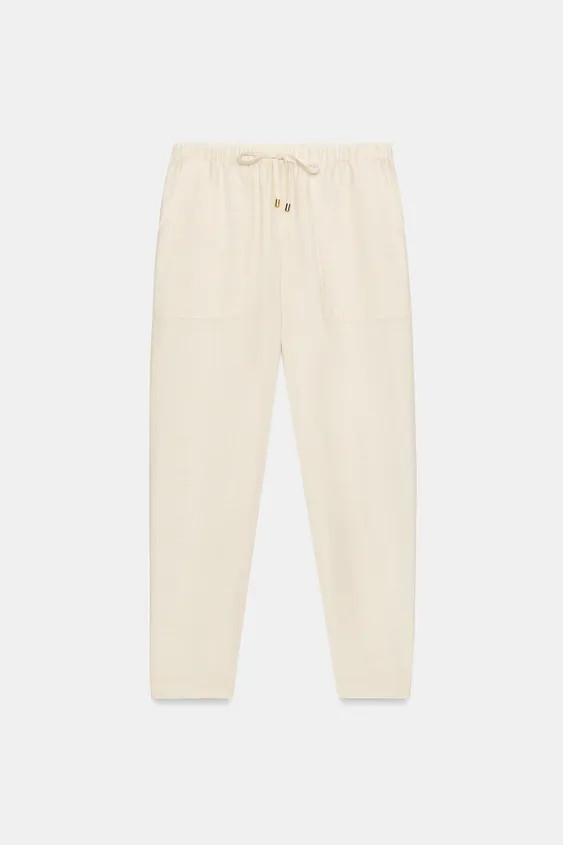 Low-rise pants with adjustable drawstring elastic waistband. Front pockets and false flap back po... | Zara US