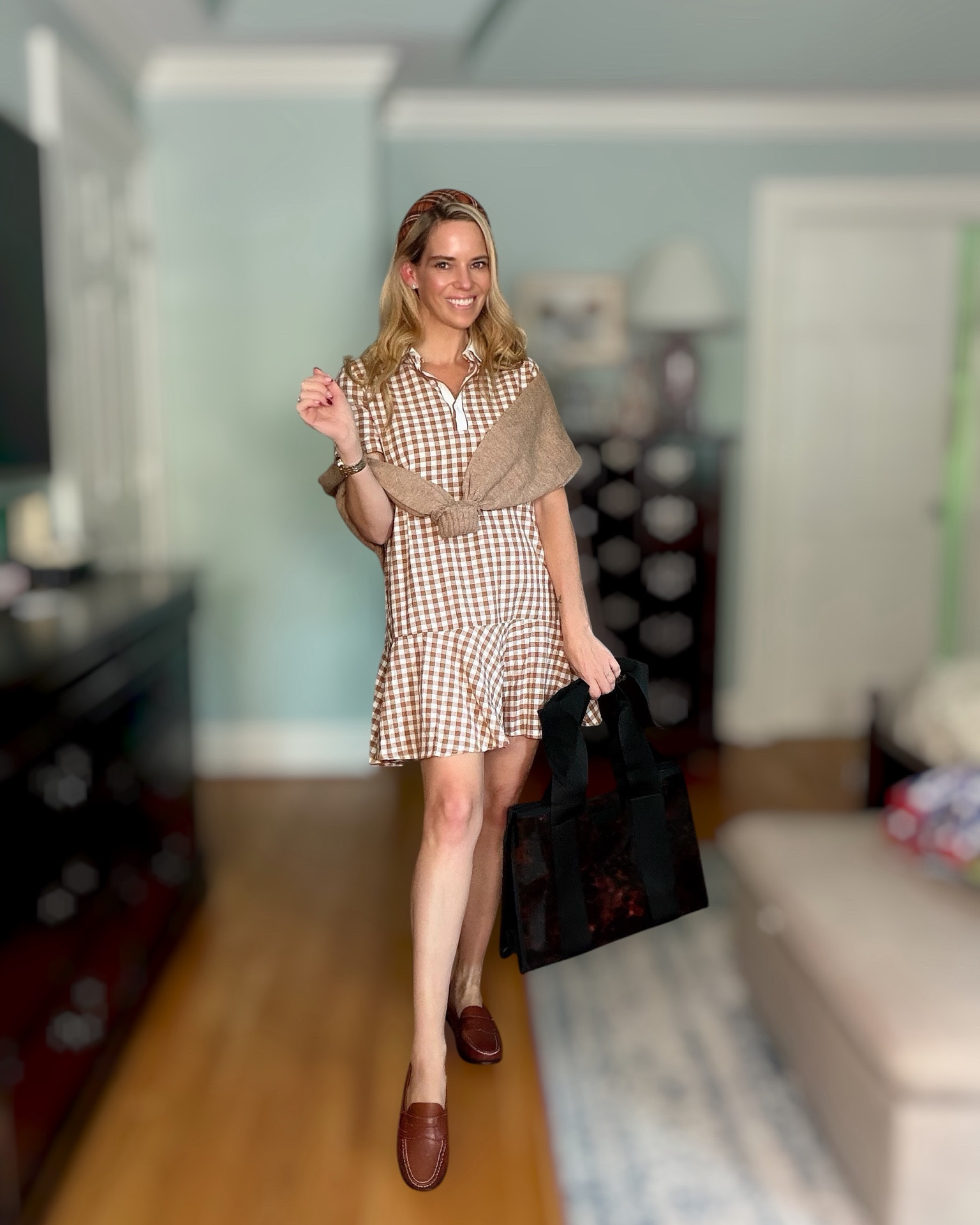 Fall Transition Gingham Dress 🤎🍂

This 100% cotton gingham dress is such a cute way to ease into fall! 🤎 The classic brown-and-white check, crisp white collar, and flirty ruffle hem make it feel polished but still playful. I added a cozy khaki cardigan, brown loafers, a plaid headband, and a statement tote for the perfect preppy fall transition look. 🍁✨

Perfect for school drop-off, brunch, shopping, or an easy everyday outfit! 👜🤎

Fall transition outfit, gingham dress, 100% cotton dress, brown gingham dress, preppy fall style, fall dresses, women over 40 fashion, classic preppy outfit, transitional weather outfit, brown loafers, fall fashion inspiration.

#LTKOver40 #LTKSeasonal #LTKootd
