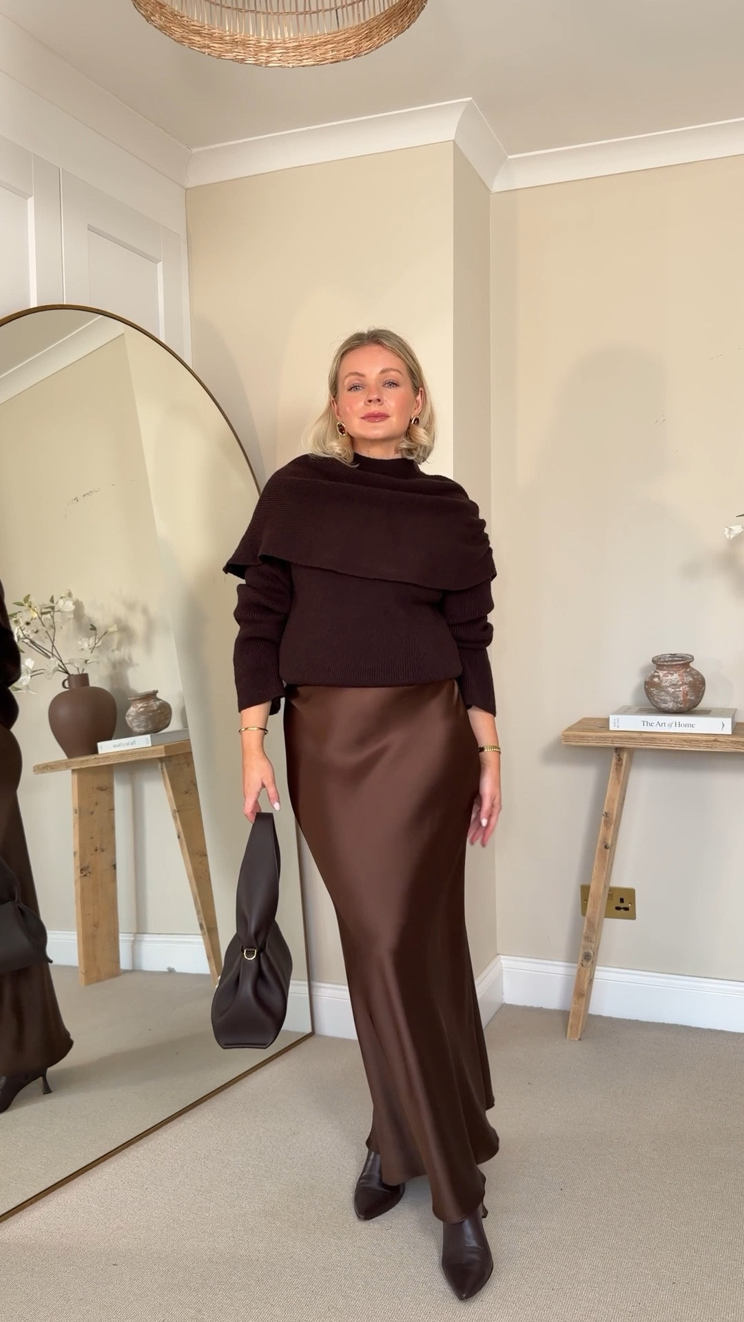  Chocolate brown winter outfit idea - pretty lavish jumper, long satin maxi skirt, brown leather heeled ankle boots, polene Paris handbag & asos brown and gold earrings  

#LTKstyletip #LTKwinter #LTKuk