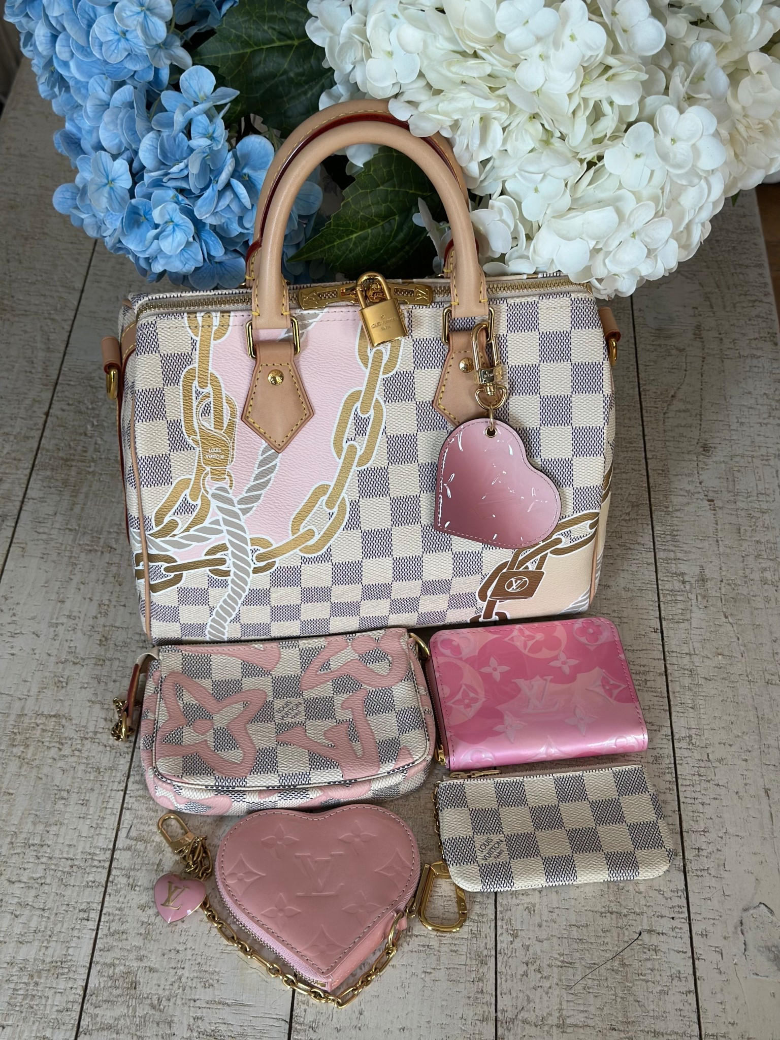 Winter white on this #pinkwednesday
Using:
LV Nautical Speedy B25 
TAhitienne Mini Pochette
Damier Azur key cles
Valentine Zippy Coin
Pink Heart Coin
Heart charm

#LTKOver40 #LTKmomlife #LTKValentine