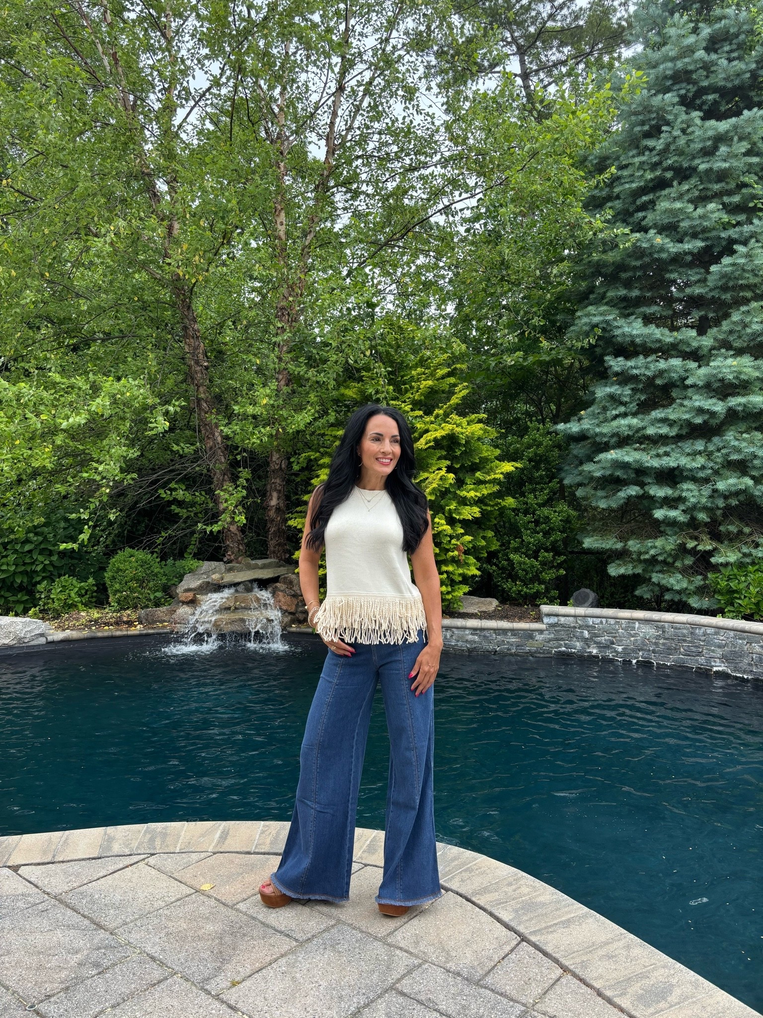 Amazon fringe sleeveless sweater with flare jeans

#LTKootd #LTKSeasonal #LTKOver40