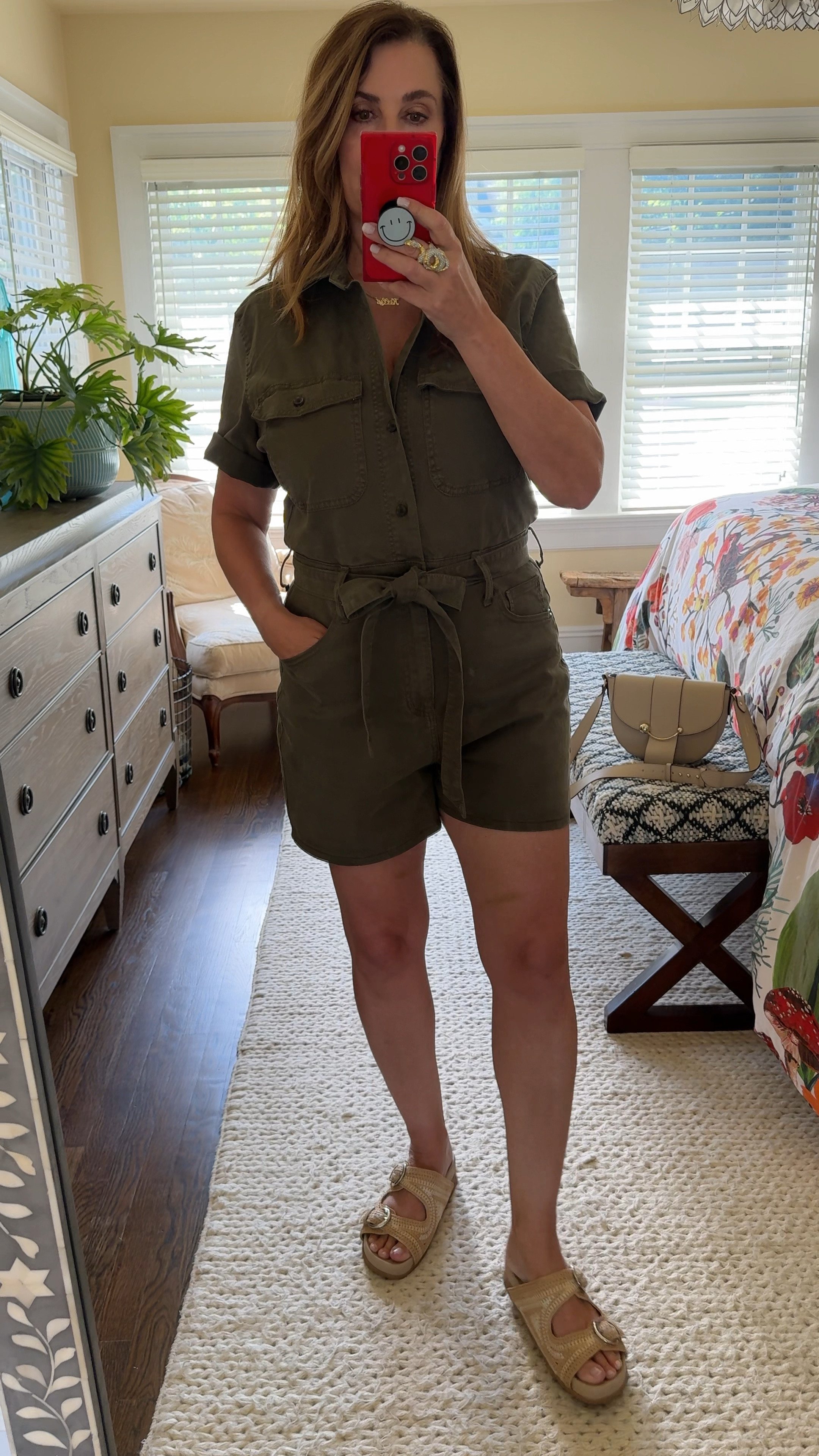 Is there anything easier than a romper for a summer outfit? Even better when it’s under $40! This would be perfect for a country concert outfit with cowboy boots! 
This shorts romper for summer is so cute and can be dressed up or down.
I like to roll the sleeves up a couple of times for a more flattering fit. Cinch the belt for an hourglass shape or remove it and add your own belt or go belt-less.
This is a heavier weight denim but it also comes in linen.
And it comes in a long pants version! 
I love it so much I got 3 (blue denim long, black linen long and this army green shorts version)!
Denim romper - size up (12)
Linen romper - TTS (10)

#LTKMidsize #LTKOver40 #LTKFindsUnder50