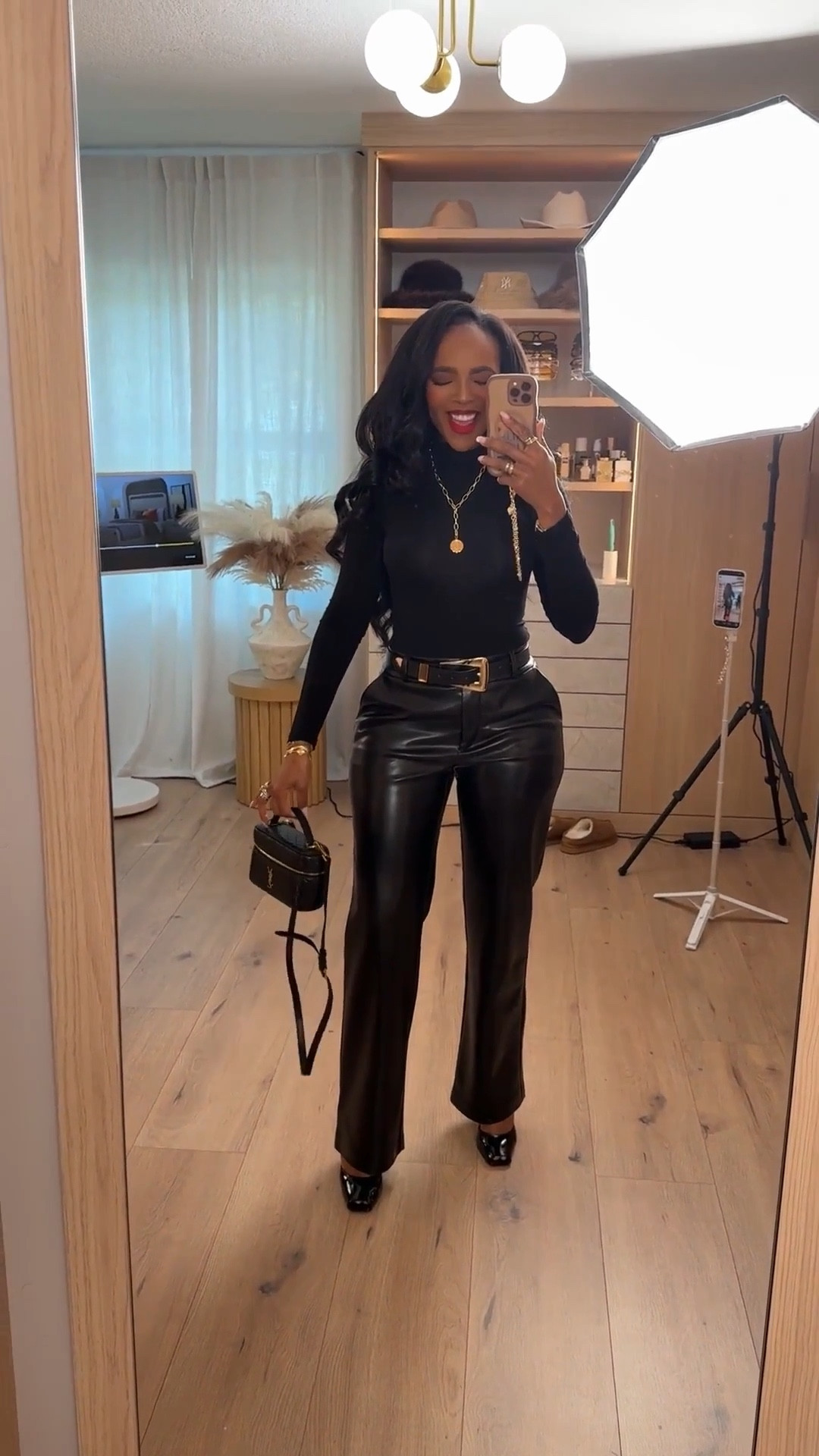 Scroll to shop 🖤  All-black everything with a little edge. A fitted long sleeve tucked into high-waisted leather trousers for that powerful, night-out energy. 

#LTKgrwm #LTKPetite #LTKootd