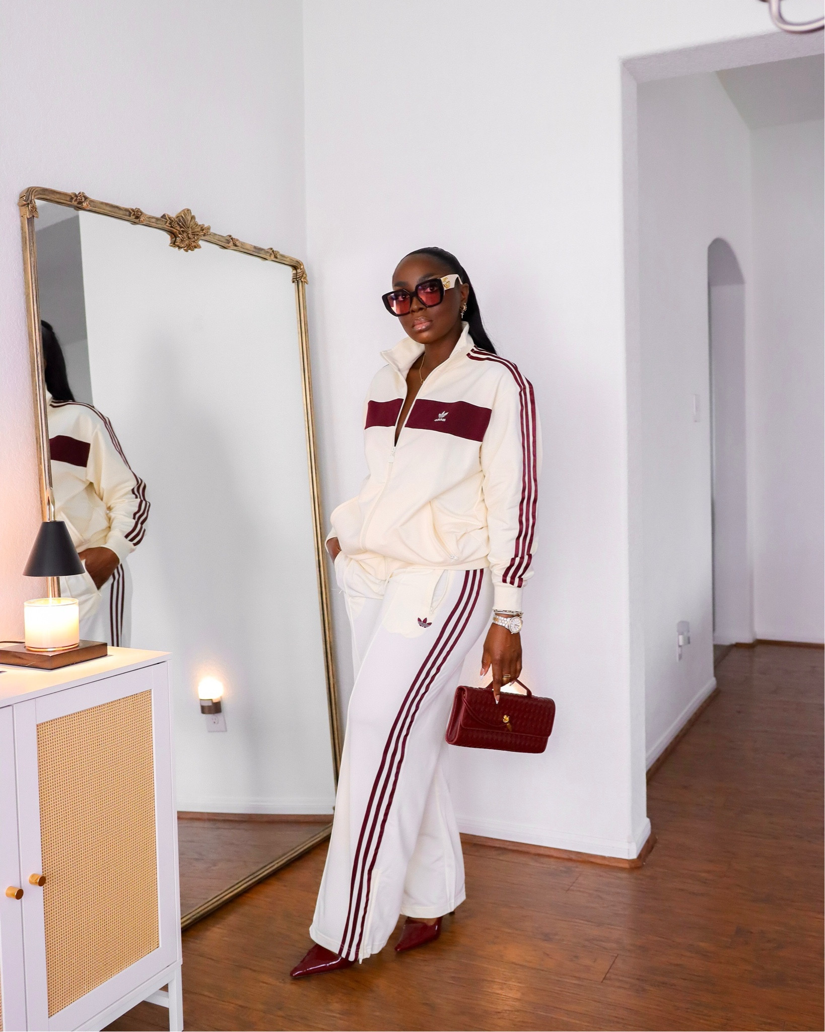 Not every pair of pants has to stick to my hips, you know? I like getting most of my pants, oversized, at least a little bit, so that it can flow straight down and allow me to move freely. My closet is full of stripes and I’m not mad about it! (Wearing a large in the pants and medium in the top.) #SpringOutfit #SpringFashion #Adidas #TravelOutfit 

#LTKBeauty #LTKStyleTip #LTKFindsUnder100