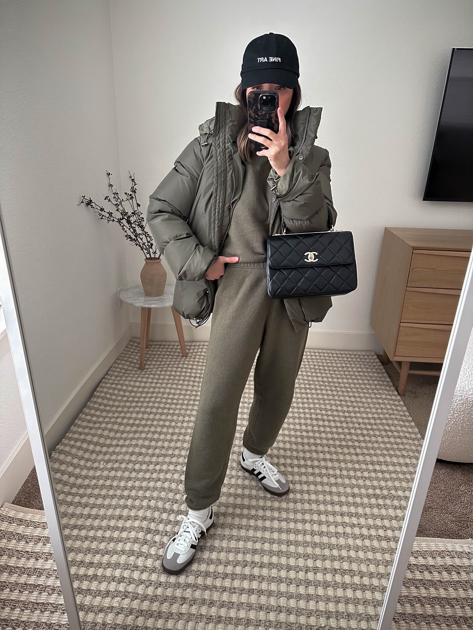 School drop-off outfit ideas. Jenni Kayne puffers runs pretty big. Size down for sure! Super warm and great quality, tho. 

Coat - Jenni Kayne xxs
Sweatshirt - Jenni Kayne small
Sweatpants- Jenni Kayne xs
Sneakers - Adidas Sambas 4.5 men’s (= to women’s 6)
Bag - Chanel Trendy cc small 
Hat - Outsider Supply

Petite style, tonal style, neutral outfit, capsule wardrobe, minimal Style, street style outfits, athleisure 

#LTKSeasonal #LTKshoecrush #LTKstyletip