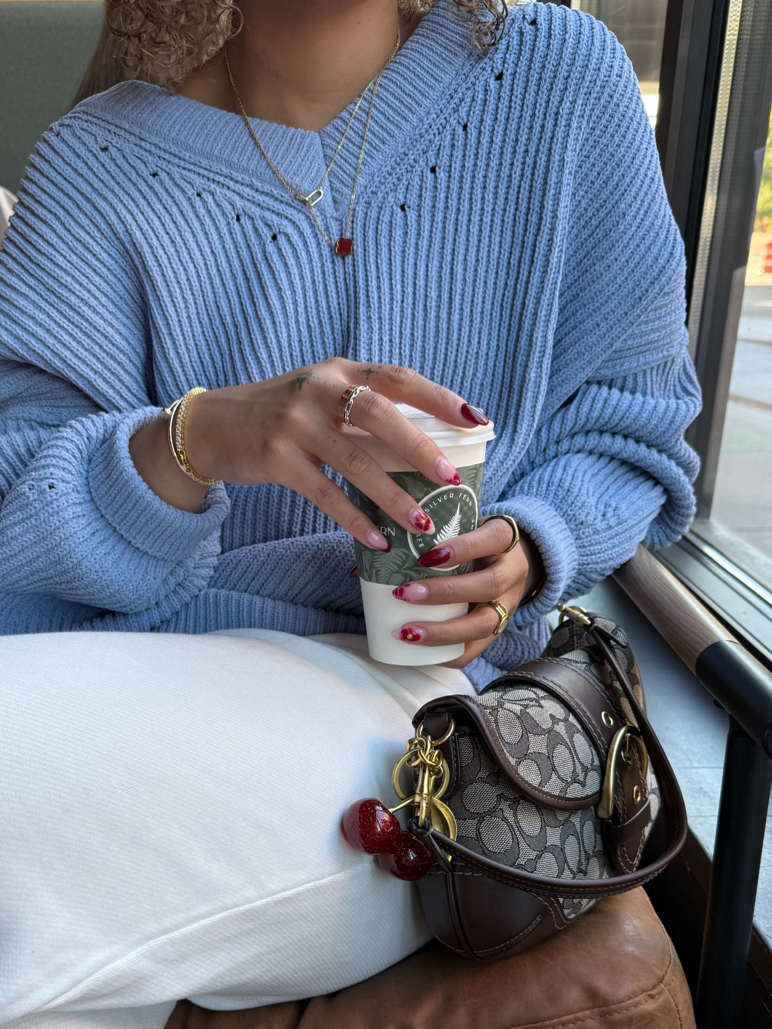 blue sweater: Large 
White sweatpants: Elwood 
