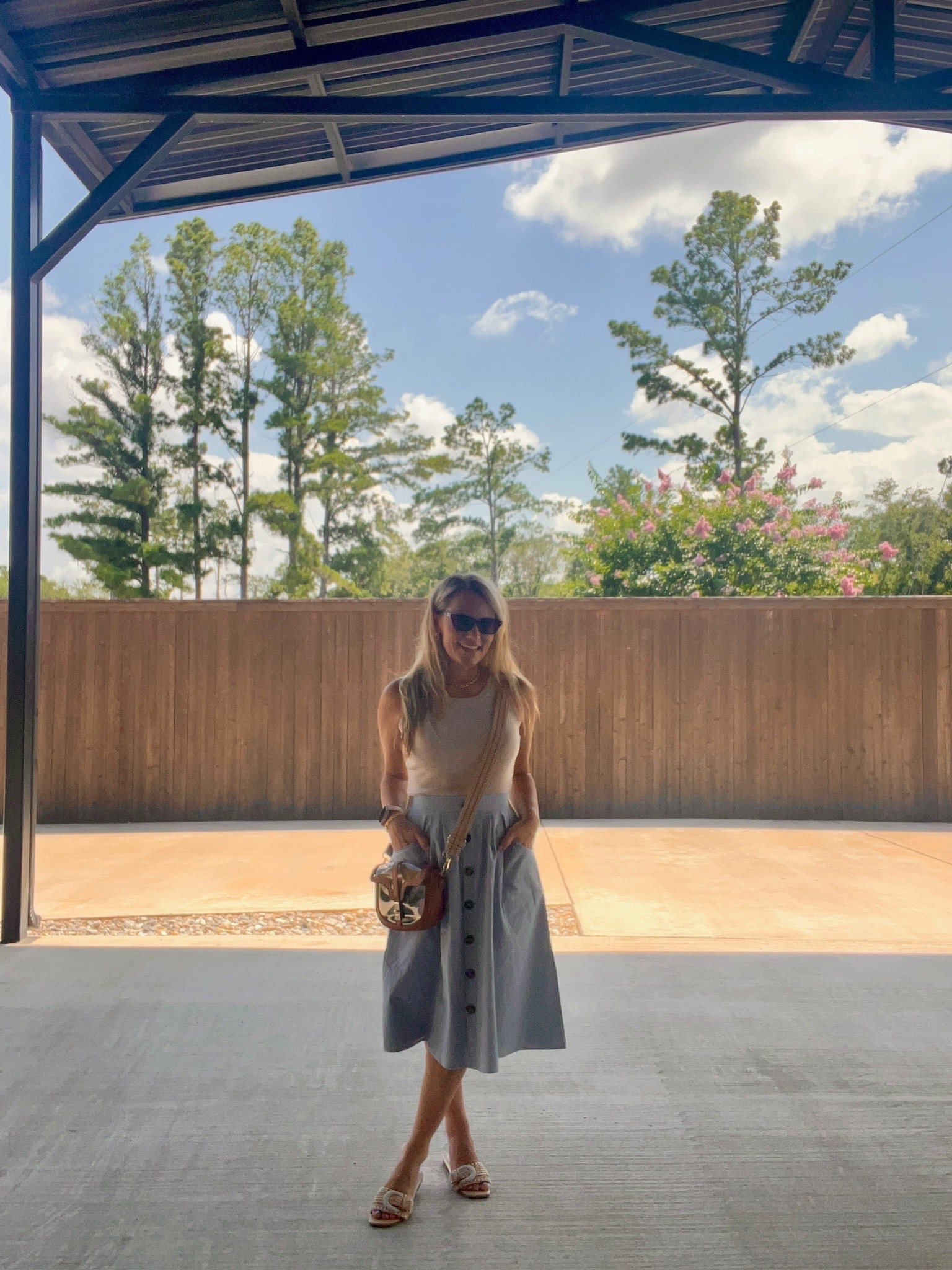 This skirt has such a classic, polished look but still feels easy enough for everyday summer plans. Paired with a simple tank and sandals, it’s an effortless outfit for brunch, vacation, church, or a day out while staying cool.

Button front skirt, midi skirt, white tank top, summer outfit, casual chic, vacation style, brunch outfit, everyday fashion, feminine style, summer wardrobe, classic outfit, AudrieDollins

#LTKootd #LTKSeasonal #LTKOver40