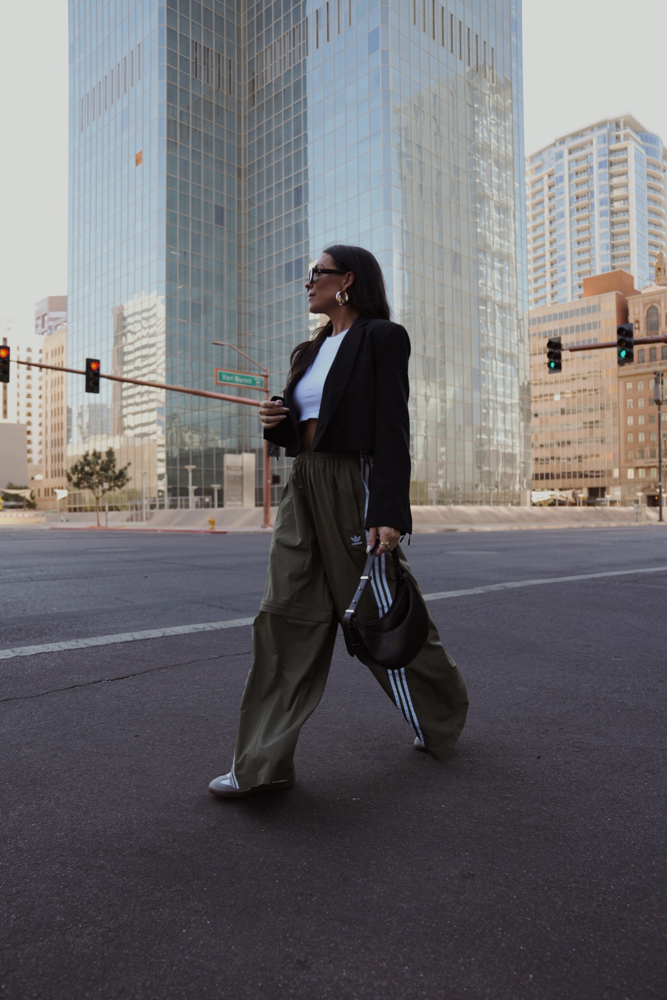 Making my way downtown 🕊️ I think track pants are going to be huge this fall and these adidas wide leg pants are so fun—I am wearing a size small!

WOMENS street look
WOMENS adidas 
Sneakers 
Cropped blazer 


#LTKSeasonal #LTKStyleTip #LTKActive