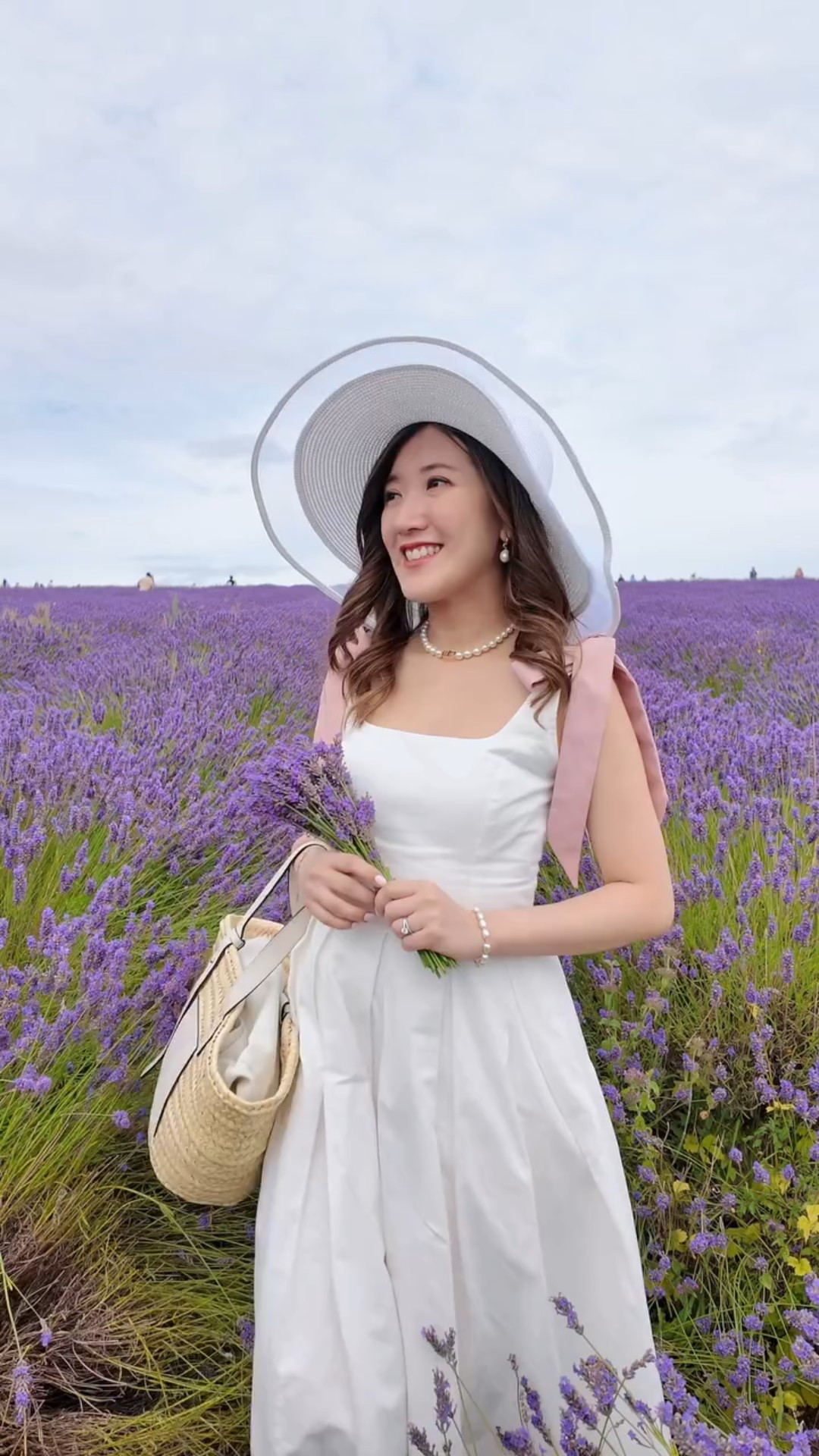 The scent of lavender, the whisper of my Giselle dress from @flossybyfreddy , and the soft blush of pink bows against the purple hues. This dress was made for romantic moments like these. 🤍🎀🪻

Outfit details🎀
Dress: Giselle @flossybyfreddy in size XXS
Bag: @loewe 

🎥shot by: @capturewithvic @vimage.pro
Osmo pocket 3 @osmo_global @djiglobal 

📍Hitchin Lavender,  August 2024

Behind the scene, me trying to act casual when a bee flies by.. Anyone else have a love-hate relationship with these buzzing buddies?🐝

#flossybyfreddy #hitchinlavender #classystyle #modernprincess #princesscore  #princessaesthetic 
#londonfashionblogger  #dreamyaesthetic #femininestyle #whitemididress #hitchinlavender #lavender #pickyourownflowers #lavenderfield #summerromance #whitedress #enchantedmoments #lavenderlove #summerstyle 

🗝️ Feminine elegant classy style, modern princess, Gossip girl Blair Waldorf style, Lavender fields, white midi dress, Flossy by Freddy

#LTKdresses #LTKsummer #LTKuk