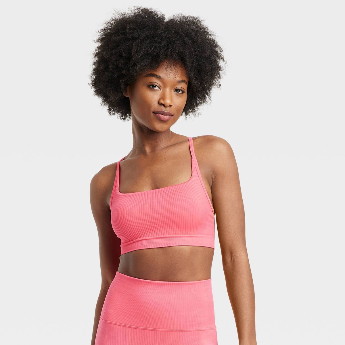 Women's Seamless Light Support Rib Sports Bra - All In Motion™ Coral Pink XS | Target