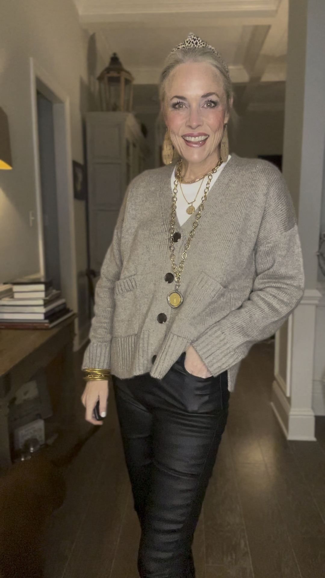 As someone whose weight has significantly fluctuated the majority of my life, I get so excited when I find clothes that are size inclusive and this outfit fits that bill. The cropped sweater from Amazon’s The Drop Collection is available in XXS-5X and comes in 8 color options. I’m in a medium in the color Heather Mushroom. It’s meant to be a bit oversized and boxy. 

The faux leather skinny pants from Shein have a lot of stretch and come in sizes XS-5X and 14 colors! I’m in a medium in black. 

Under the cardigan I’m wearing a long-sleeved pretty fitted white ribbed tshirt and have paired it all with black cowboy boots. The tshirt comes in XS-XXL and 16 colors  All from Amazon. 

My jewelry is a mix of finer jewelry from Jennifer Ponson Designs (code Lauren10), Nickel and Suede earrings and super affordable Amazon pieces, as well. My headband is from Target. 

As a reminder for reference, I am 53, 5’8, and 140 lbs. 

#LTKGiftGuide #LTKplussize #LTKmidsize