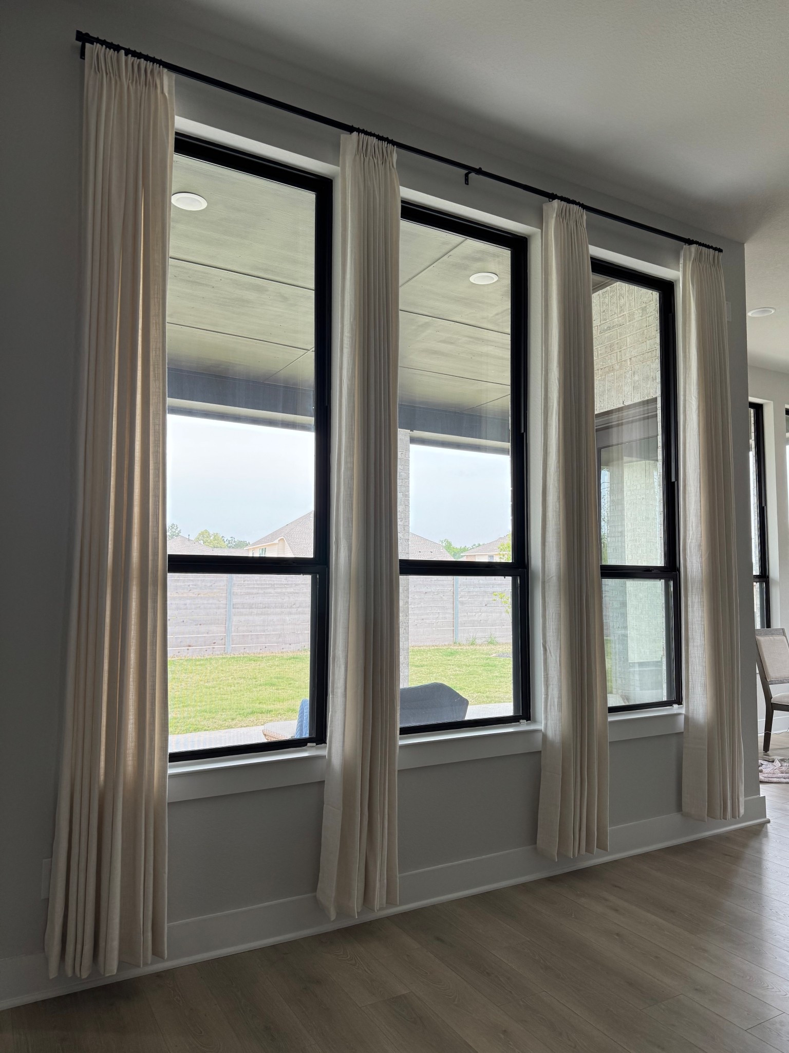 Finally hung our new custom Liz linen drapes. Ivory white color, pinch pleated, with 70% room darkening 

#LTKStyleTip #LTKHome