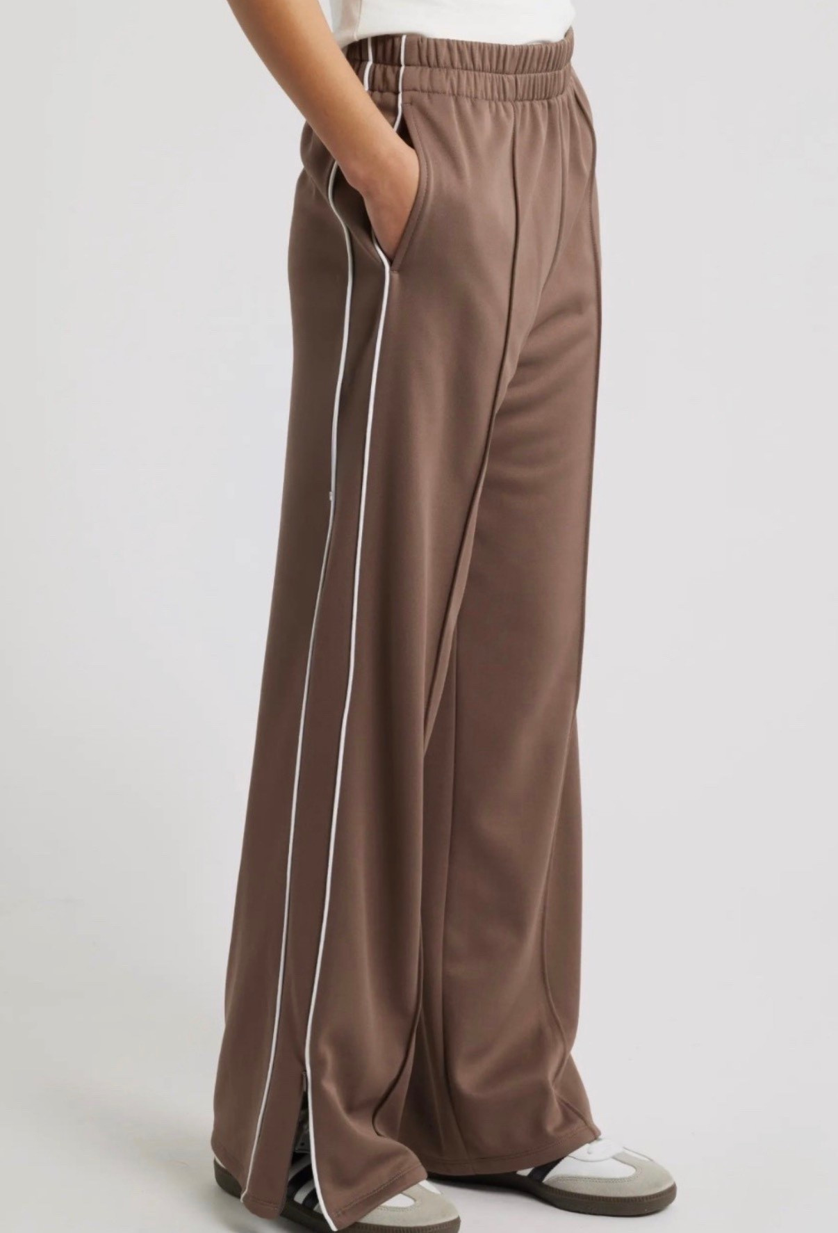 Track pants
Wide leg track pants #LTKfitnessgoals

#LTKActive