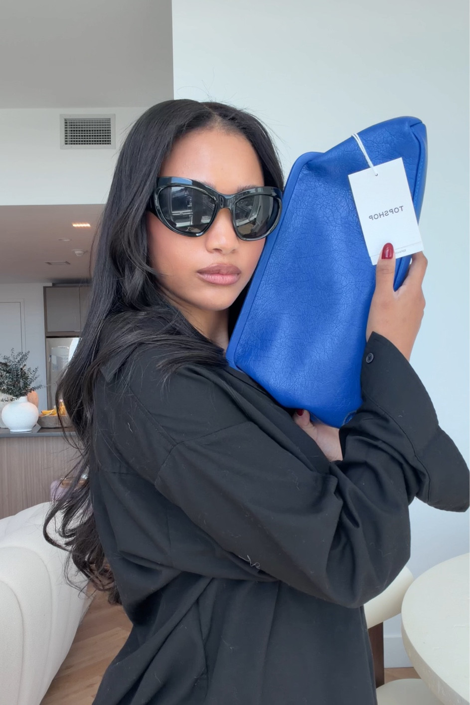 This blue clutch omg 