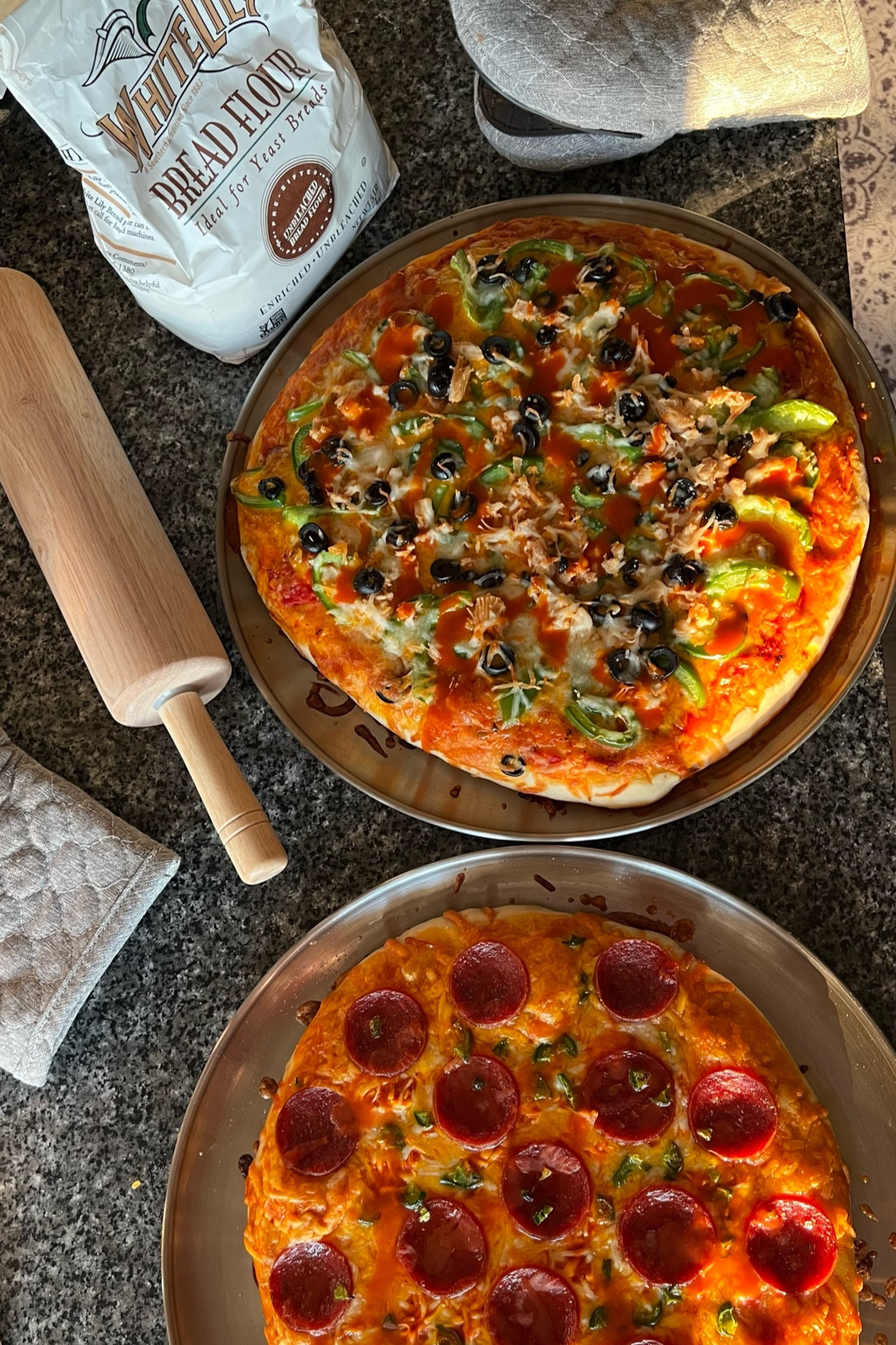 Yummmmm

We’ve always done ‘make your own pizza night,’ but recently amped it up and started making the dough!!!! Sooo good, and so much fun too! We put on some Italian music and go to town on toppings 🍕🌶️  I linked the stainless steel pan and cutter we use + sometimes we roll it out because we aren’t professionals 🤣🫶🏼

Here is the recipe for the dough:
https://pin.it/6KlRyKfkB