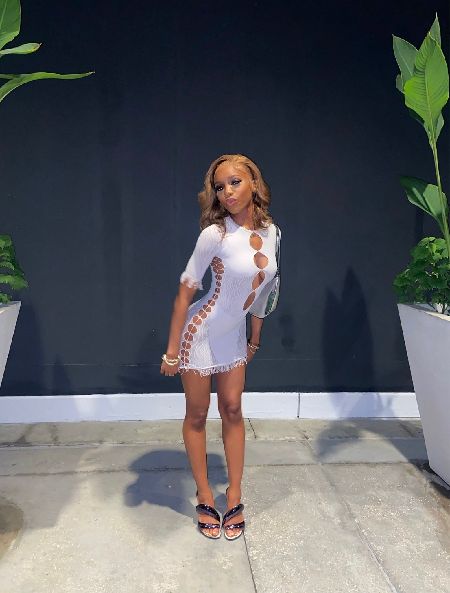 going out/dinner date outfit, white lingerie see-through dress paired with black heels 