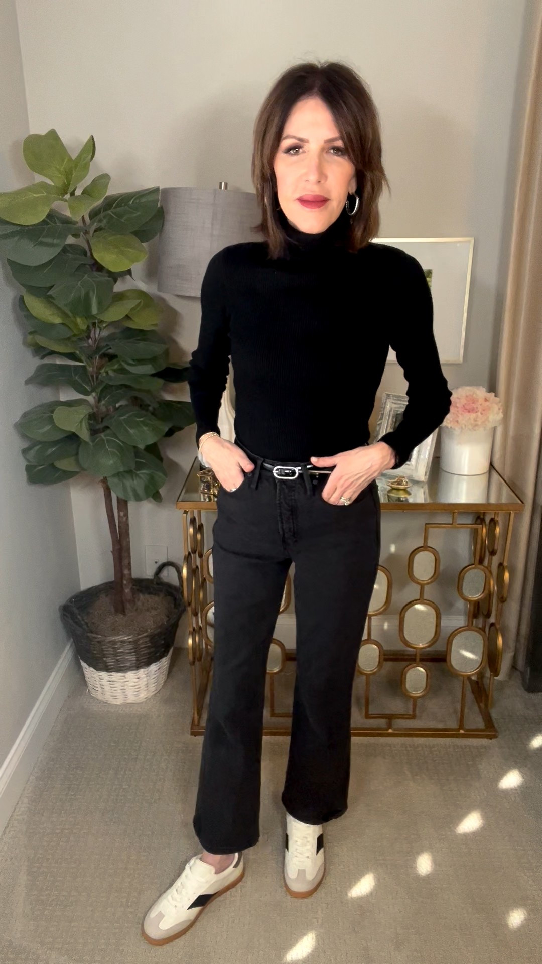 black turtleneck, black kick flare jeans, neutral sneakers, over 50 outfits 

#LTKootd #LTKOver40 #LTKSeasonal