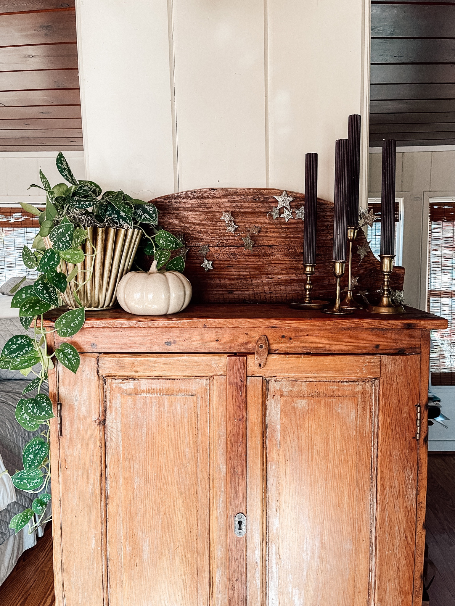 Black candles are about as spooky as it gets over here! Took my everyday decor and made it ‘fall’ by adding a ceramic pumpkin, black candles and a star garland (that I may need to use year round ✨). 

#LTKHoliday #LTKSeasonal #LTKhome