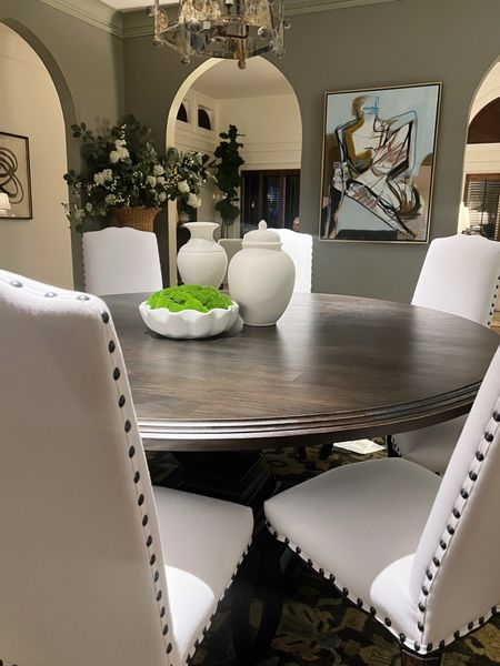 Round dining table, white sunbrella chairs

#LTKhome