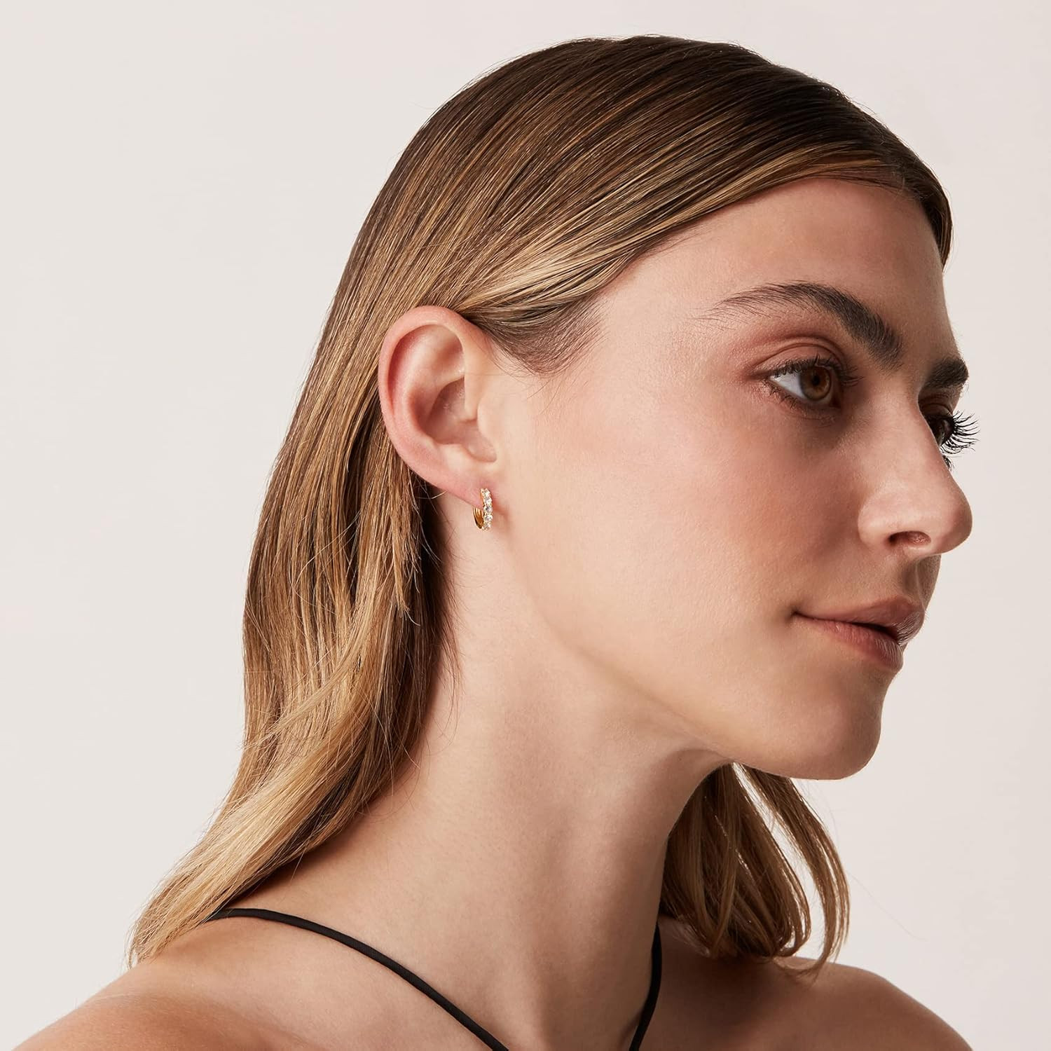 PAVOI 14K Gold Plated Sterling Silver Post Pave Cubic Zirconia Huggie Hoop Earrings for Women | Amazon (US)