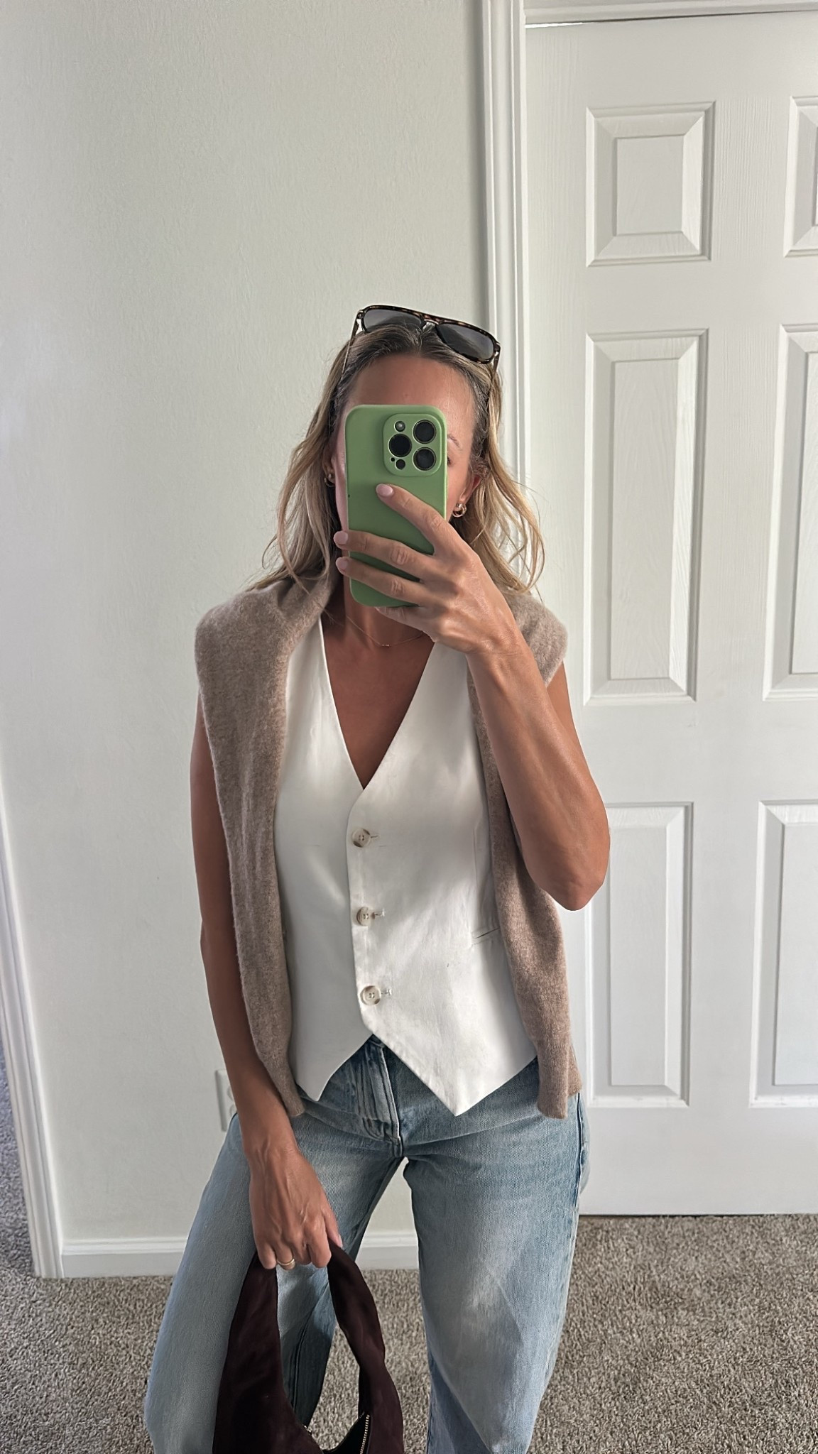 Your vest is a perfect transitional piece for this early fall late summer weather. Casual but elevated outfit with cashmere sweater for a little warmth especially great if you’re going into cold air conditioned offices. Cozy and gives the fall vibe while still being comfortable. Also prepare to be sick of these jeans because they’re my favorite pair of denim I own at the moment 

#LTKFindsUnder100 #LTKOver40 #LTKMidsize