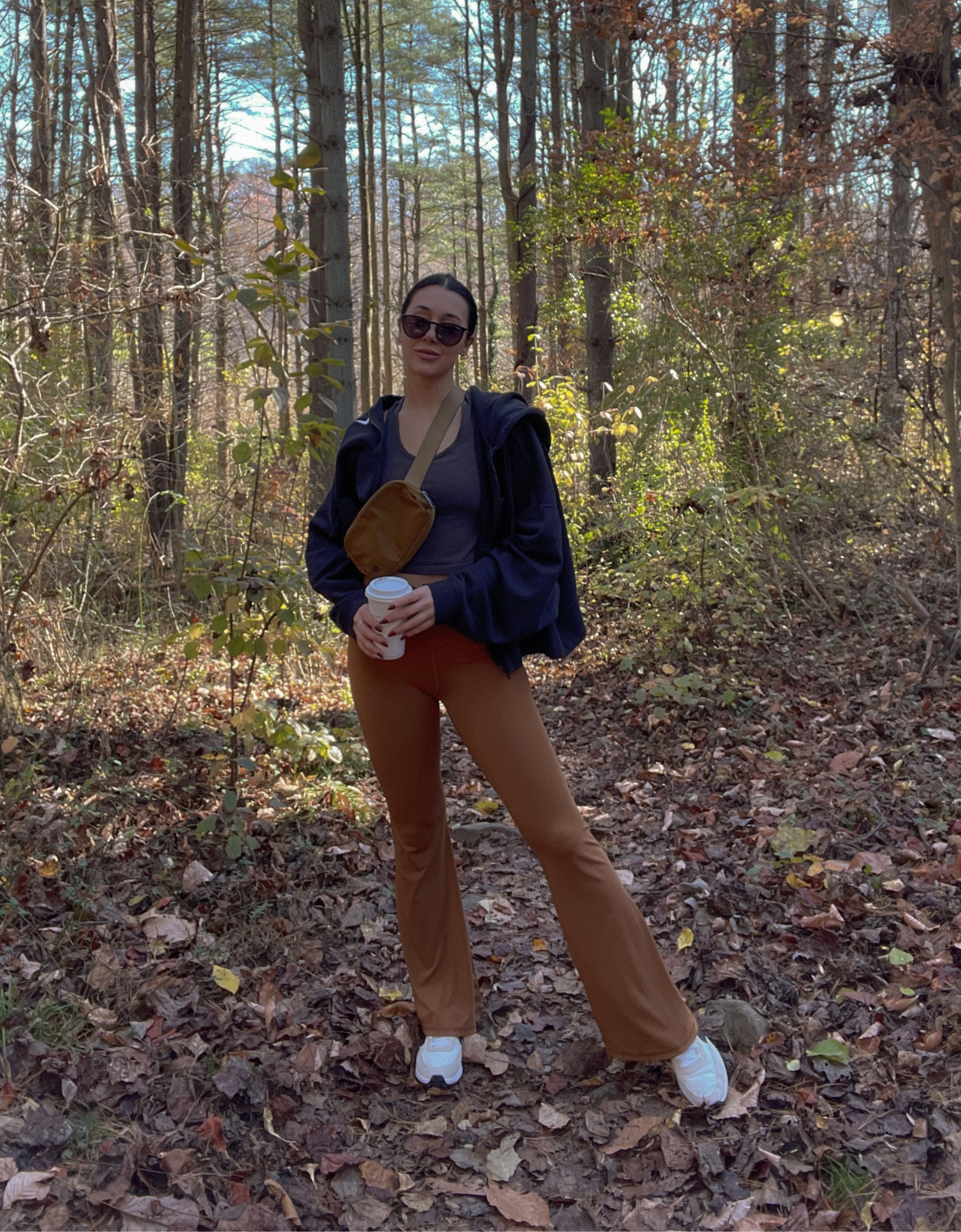 fall walks 🍁🍂🤎
- burnt caramel lulu lemon bag 
- caramel wide leg aerie yoga pants 
- tan / white / black nikes
- ray ban sunnies 

#LTKHoliday #LTKSeasonal #LTKshoecrush