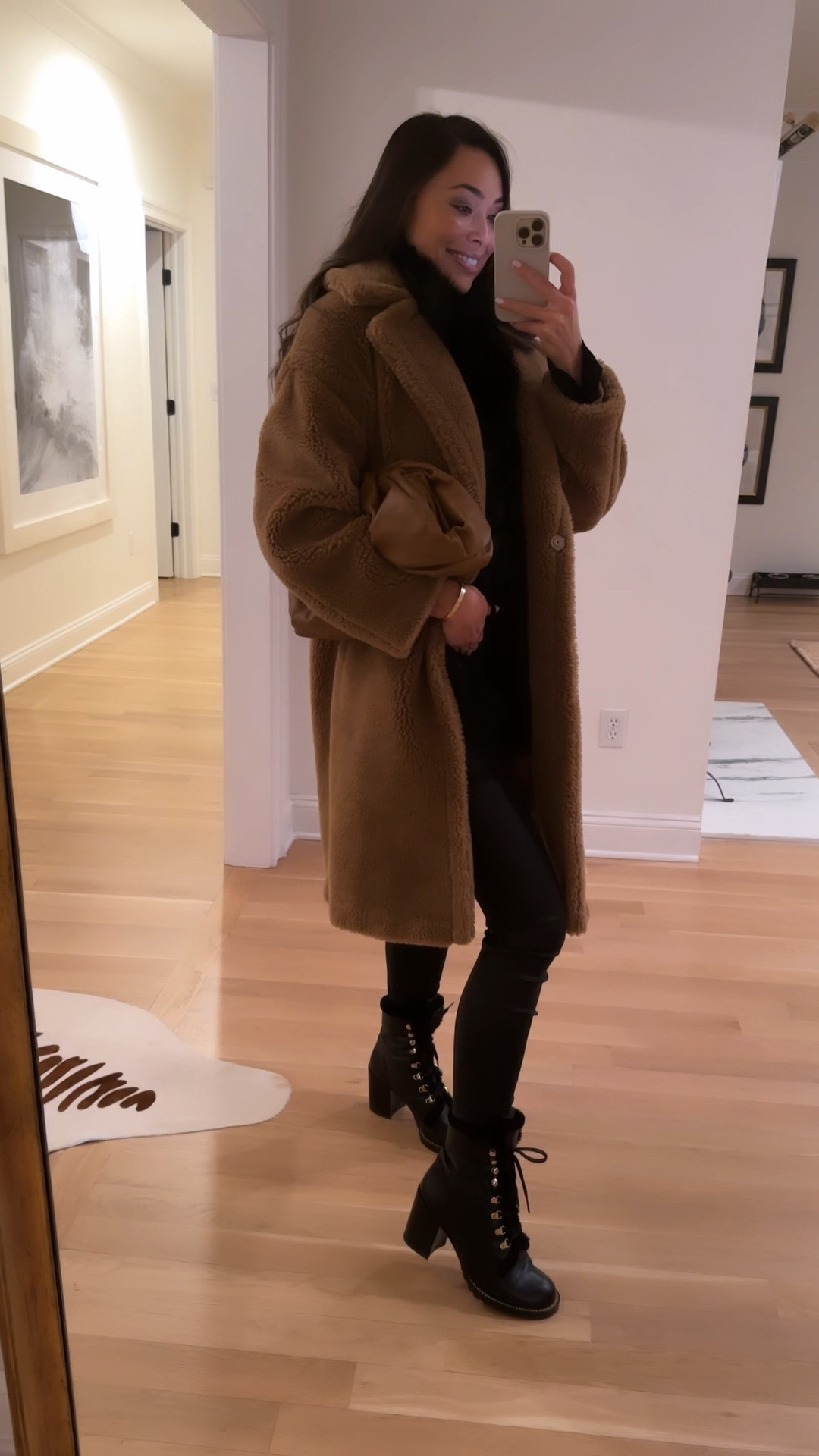 Kat Jamieson wears a winter outfit. Teddy coat, boots, winter outfits, booties, heeled booties, snow boot, Bottega Veneta clutch. 

#LTKshoecrush #LTKSeasonal #LTKitbag