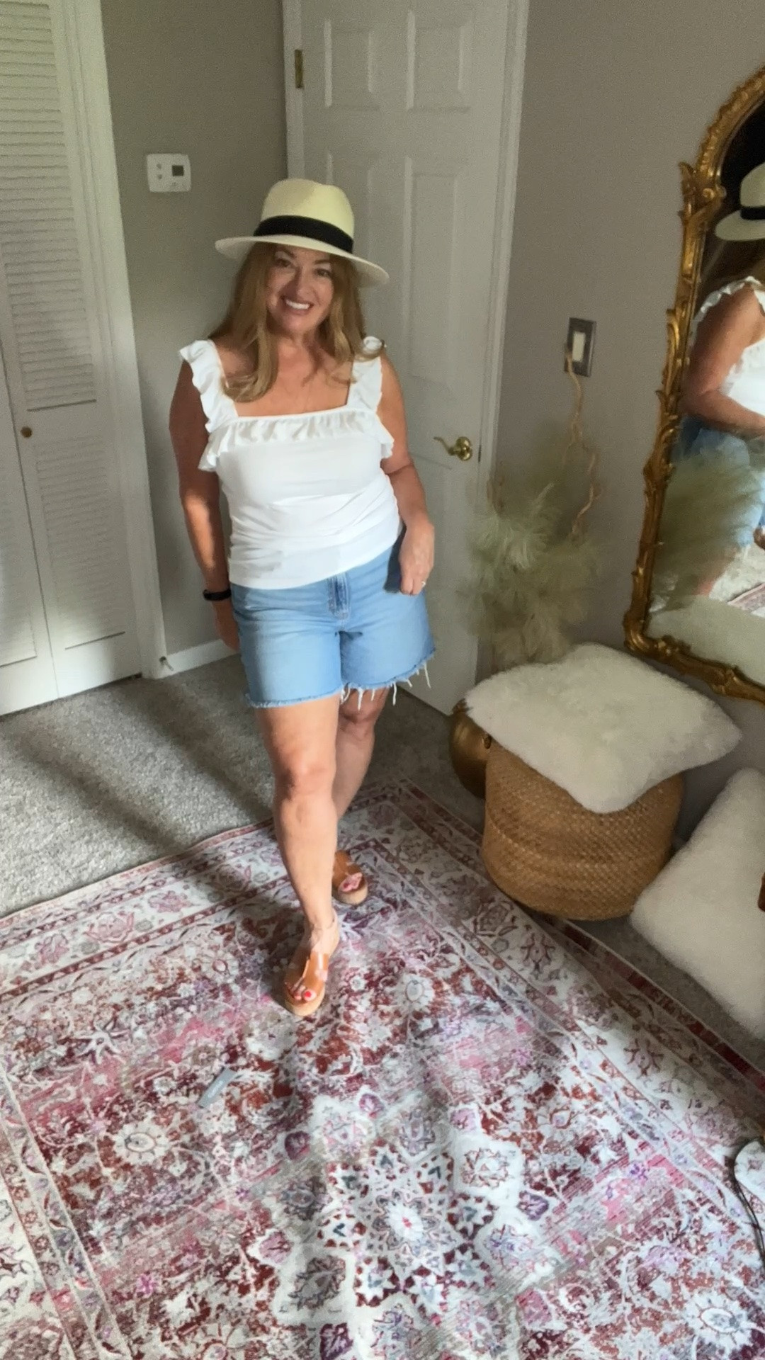 White ruffle tank top. Perfect with denim shorts, skirts, slacks. Super versatile

#LTKWorkwear #LTKmorningroutine #LTKdayinmylife