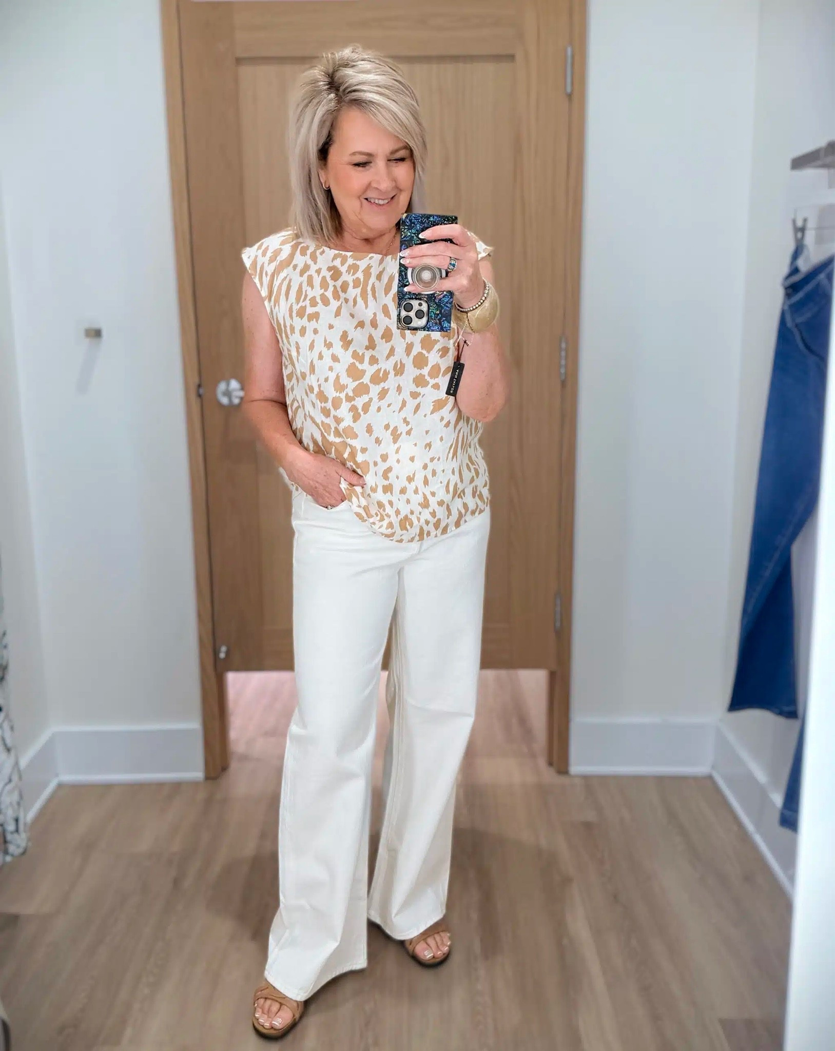 This is another favorite from Ann Taylor. My linen blend top is fun, but still neutral  in color and I’m wearing a medium. The white wide leg jeans will be worn often and I’m wearing a size 10.

#LTKootd #LTKOver40 #LTKWorkwear