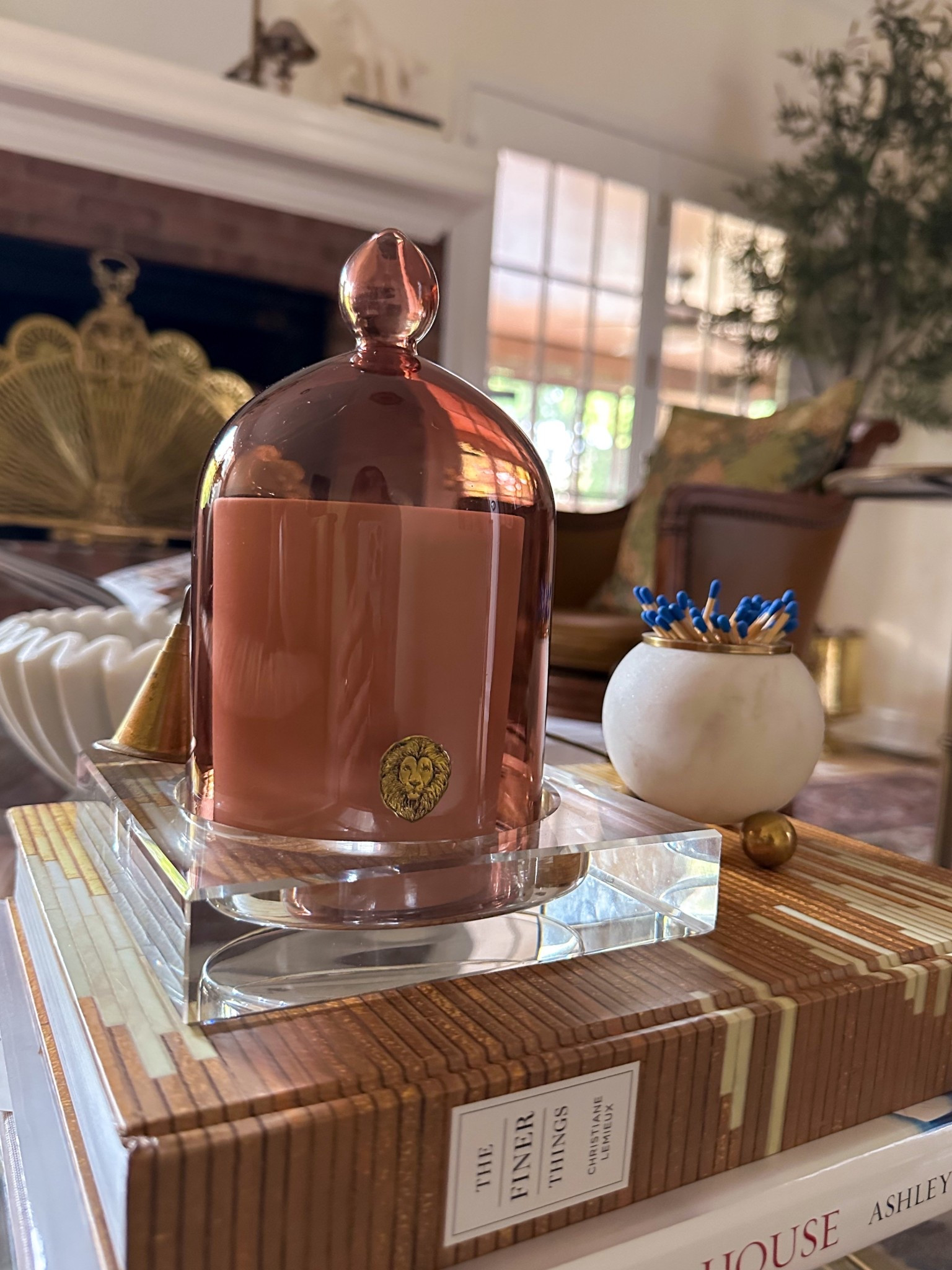 This is my go-to formula for timeless coffee table styling: mix materials, keep it balanced, and let the textures do the talking. The glass cloche candle, brass accents, and designer books create that layered, collected vibe I love. Perfect if you’re looking for living room styling ideas, moody home decor, or classic traditional design inspiration. Shop the look: decorative candle, match striker, and coffee table books.