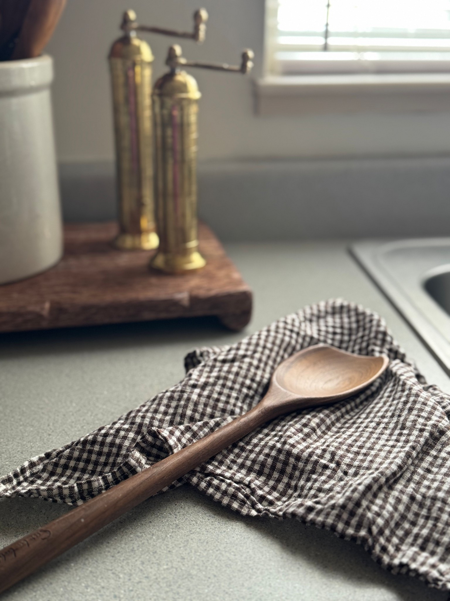 Gingham hand towel, wooden spoon, wooden utensils, wood riser, salt and pepper grinders, brass grinders, kitchen decor 

#LTKHome #LTKSaleAlert #LTKSeasonal