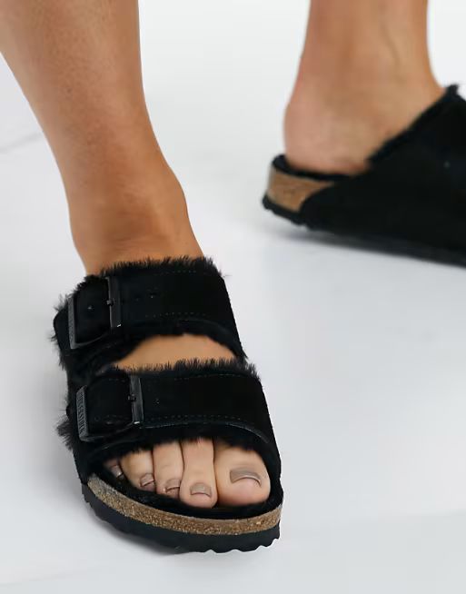 Birkenstock Arizona flat sandals in black with fur lining | ASOS (Global)