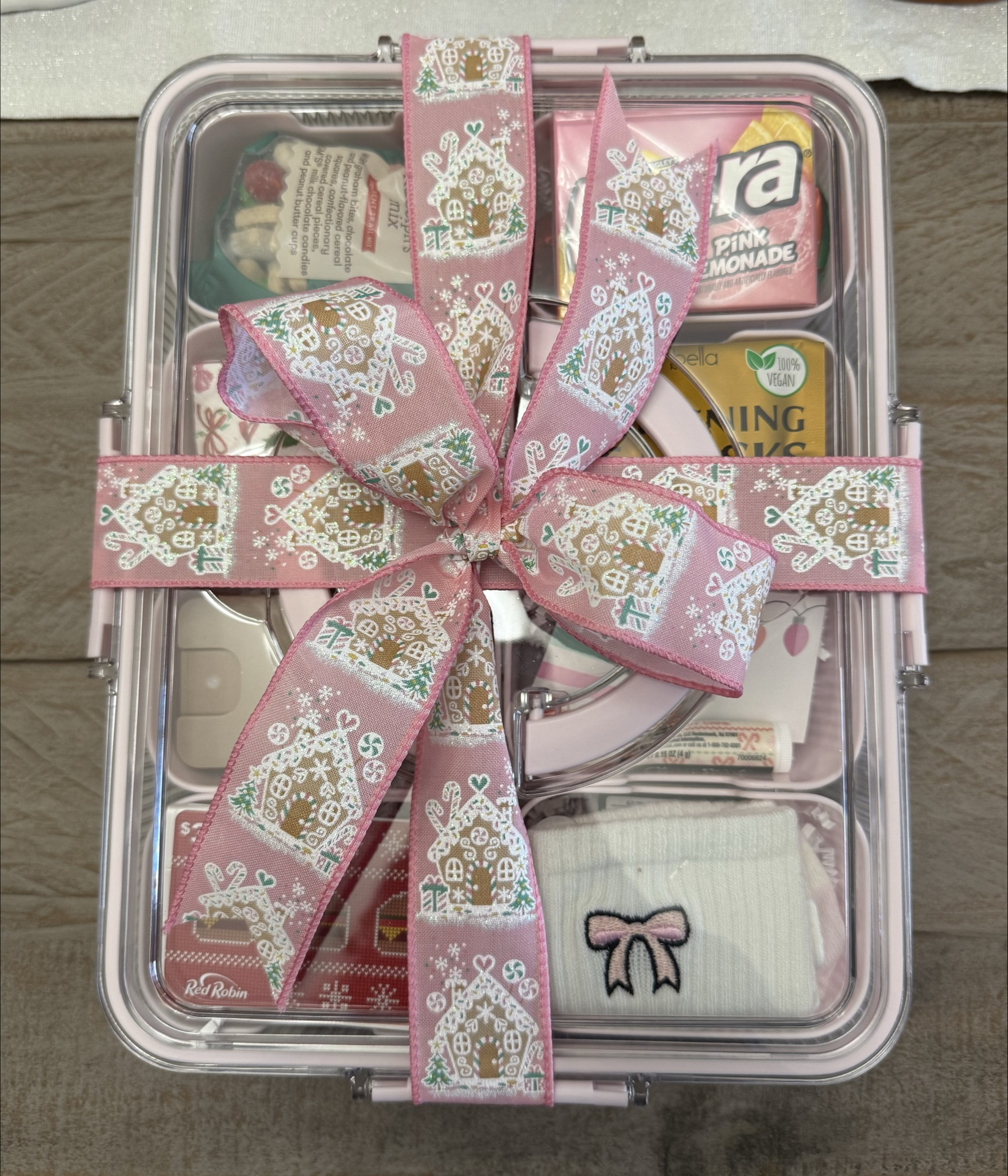 The cutest holiday gift for a teacher or bestie! Pop in a gift card to their favorite place and you’re good to go! (Exact ribbon and tissues are from Hobby Lobby and can’t be linked).

#LTKHoliday #LTKmomlife #LTKGiftGuide