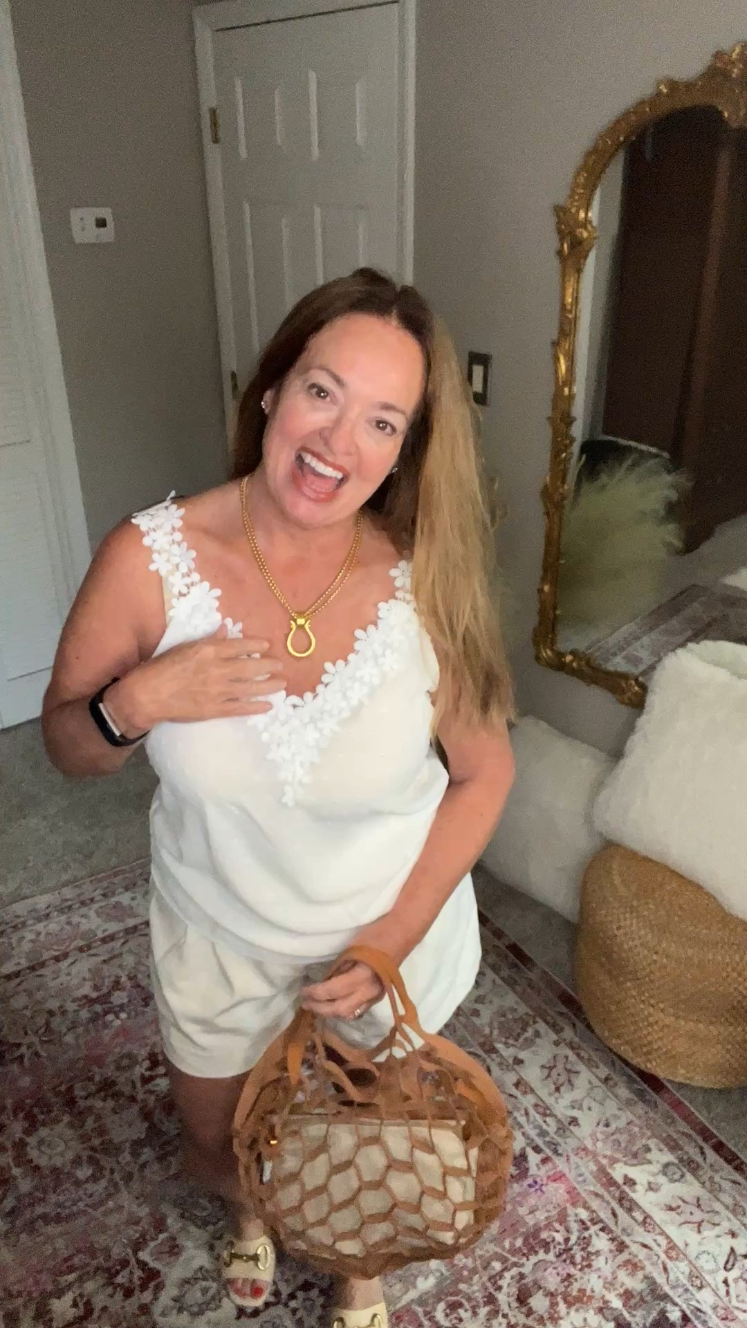 The beautiful floral lace shoulders make this white tank extra special.

#LTKmorningroutine #LTKgrwm #LTKmomlife