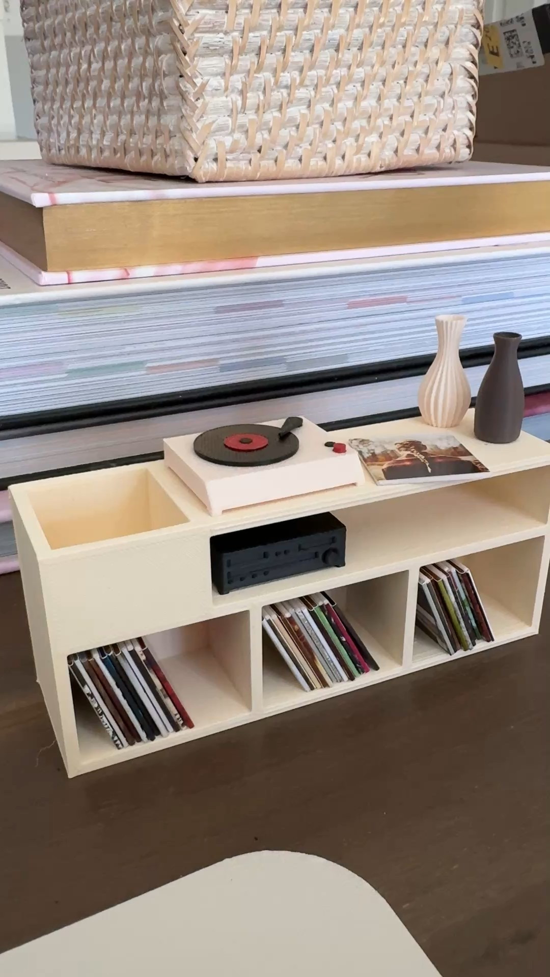Super niche, super adorable, and super unique, I adore this mini custom vinyl record cabinet. You send the maker your list of albums and your color preferences for the cabinet and accessories, and this is what you get ♥️ Obsessed and great gift for a vinyl lover. I got one for Dave for Christmas. 

#LTKHome #LTKGiftGuide