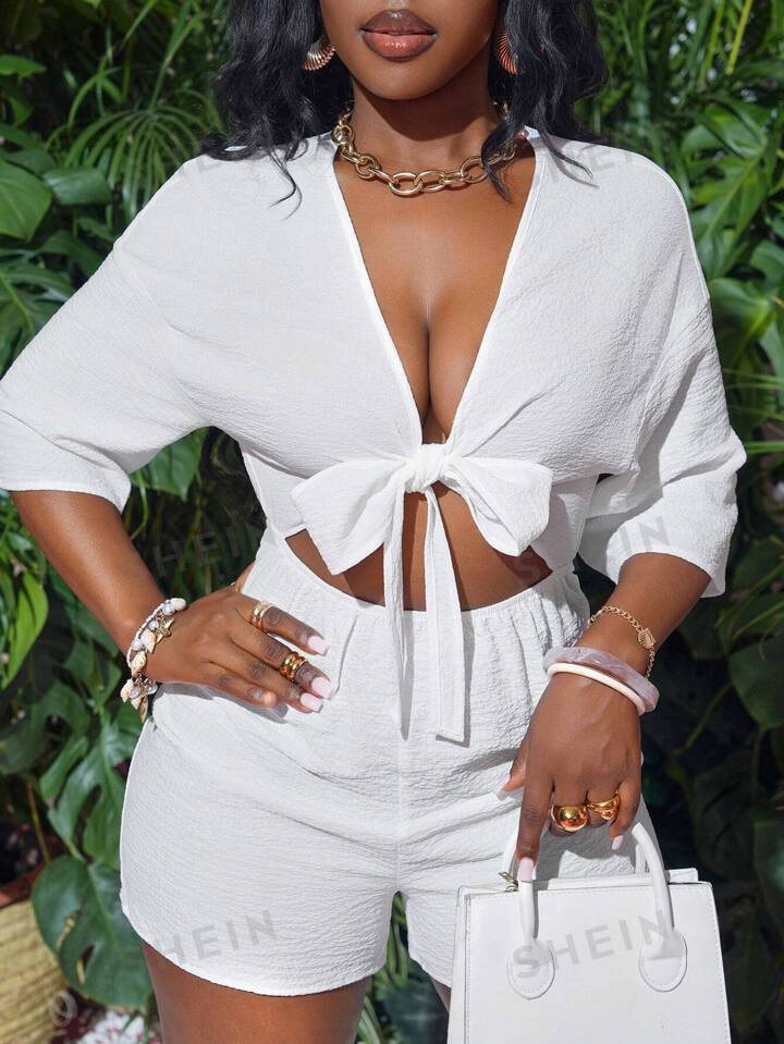 SHEIN Slayr Summer Vacation White Twist Front Hollow-Out 3/4 Sleeve Loose Romper | SHEIN USA | SHEIN