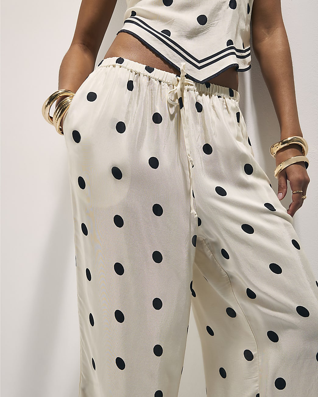Cream Spot Print Wide Leg Trousers | River Island UK & IE