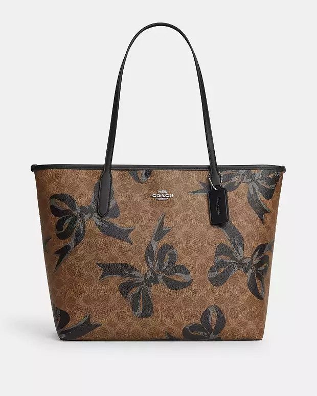 City Tote Bag In Signature Canvas With Bow Print | Coach Outlet US