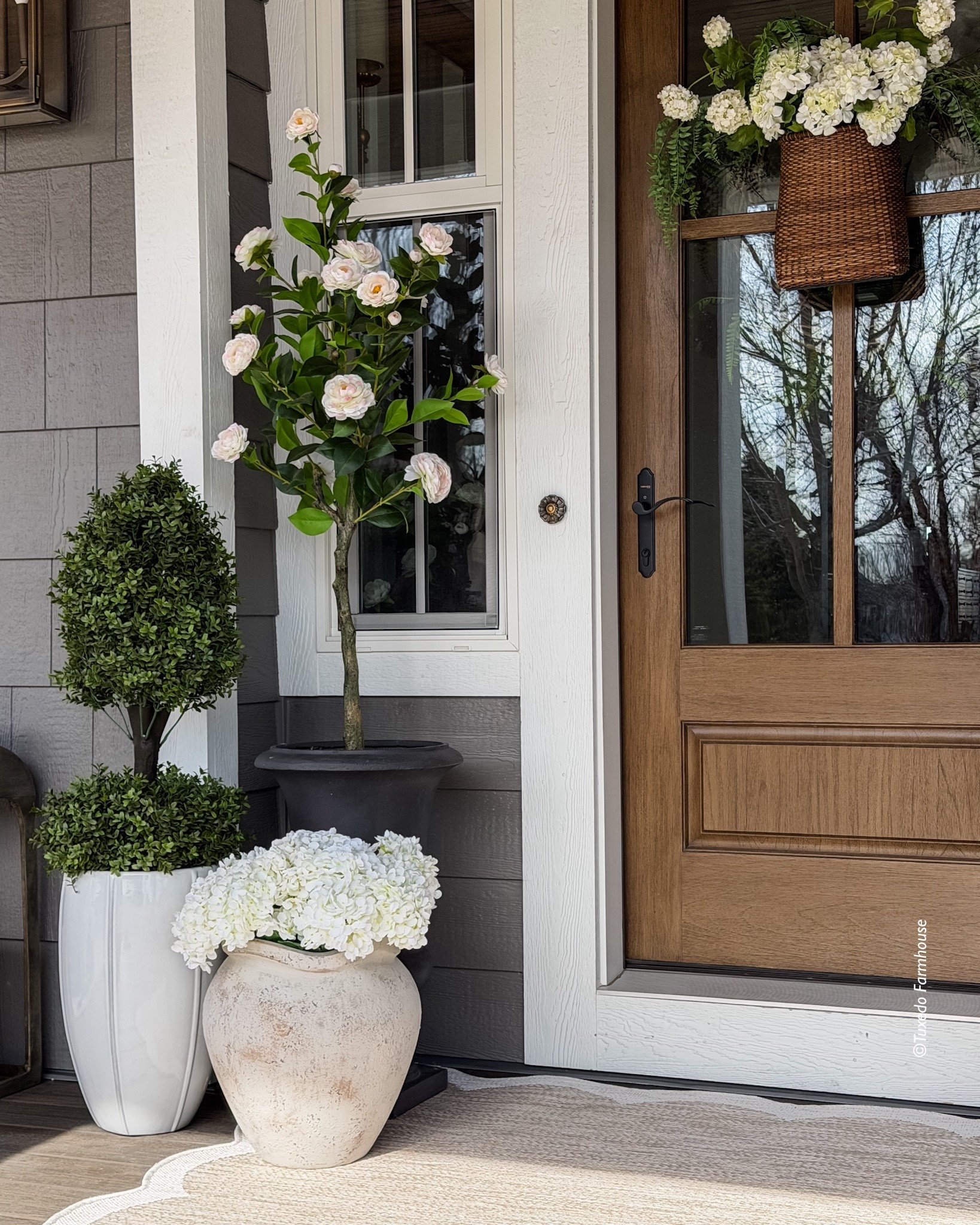 — Can you tell it’s all faux? I switched to faux plants on my front porch a couple years ago
because it is cleaner, always looks nice and I have enough to take care of with my gardens. 

 #LTKSeasonal #LTKHome #LTKSaleAlert